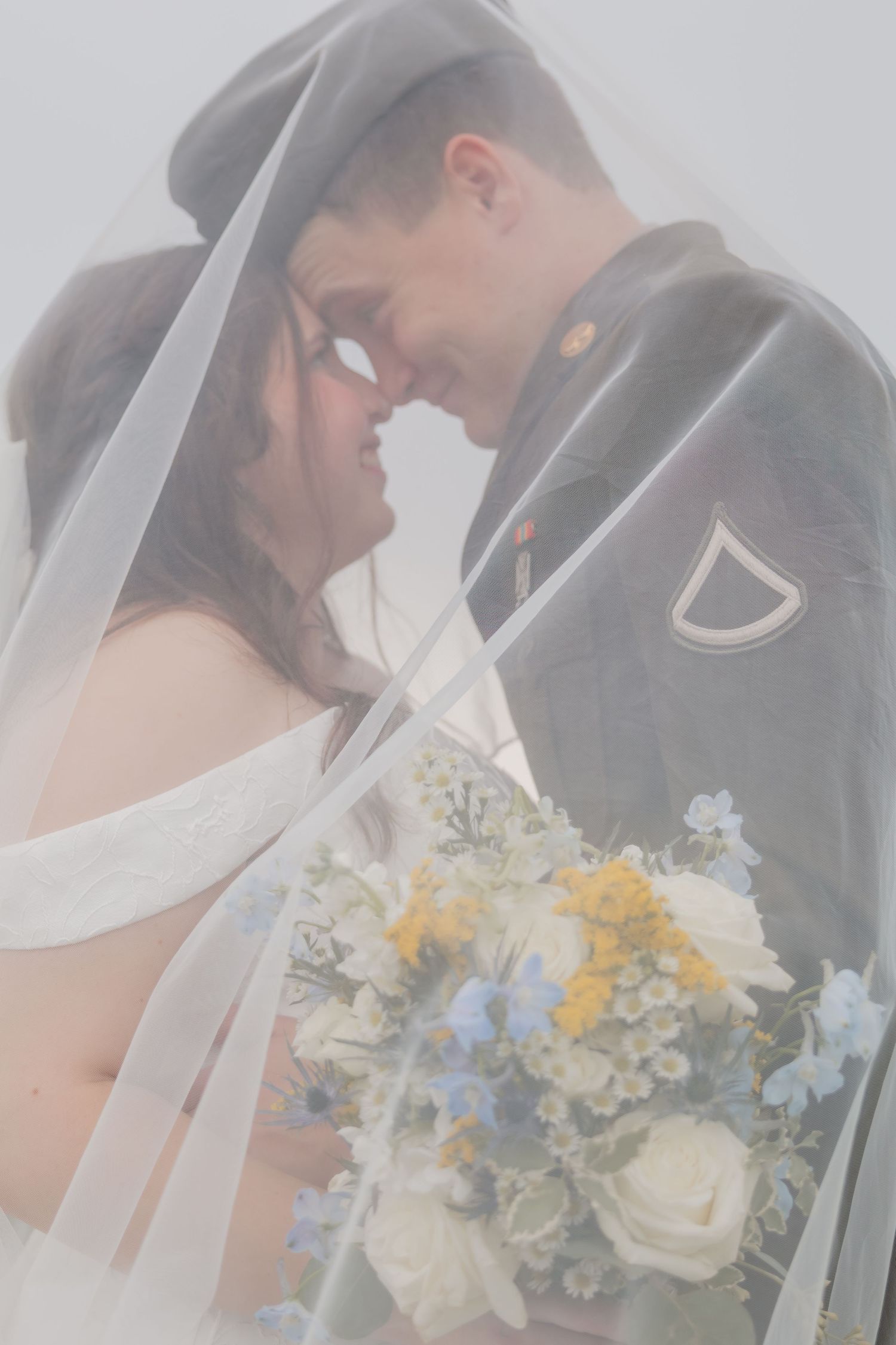 Close-up wedding photos with white and yellow bouquet details.