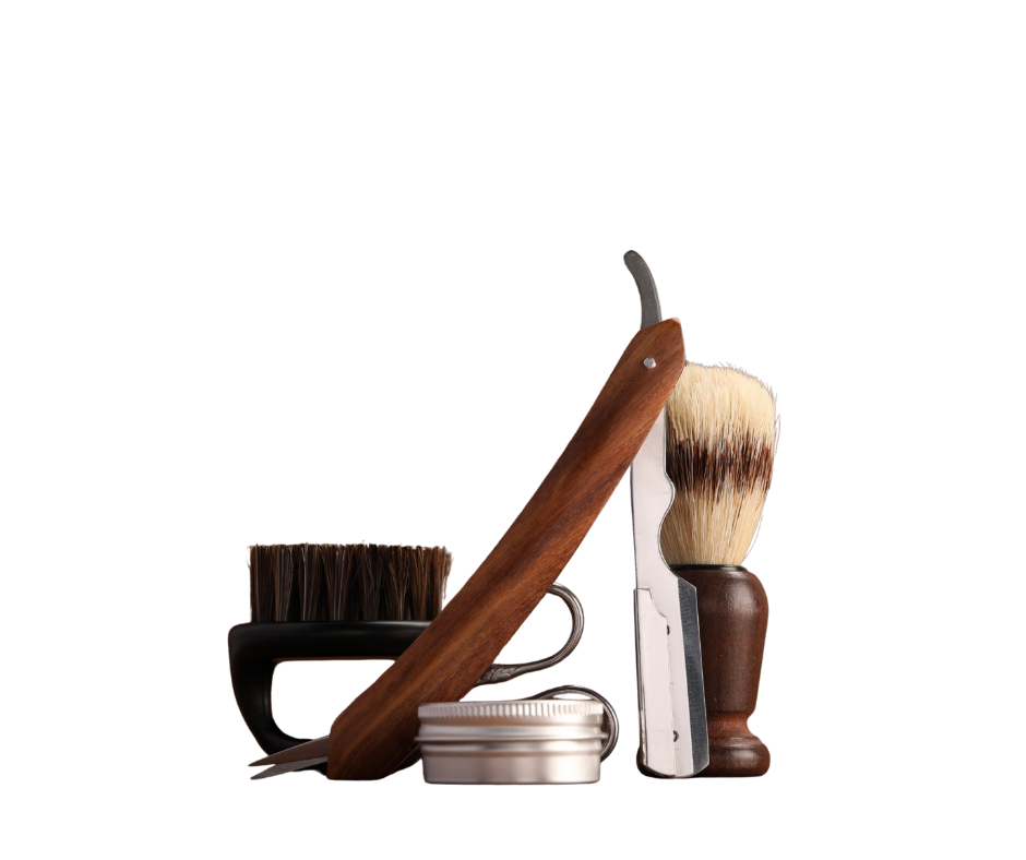 Collection of vintage-style shaving brushes and grooming tools arranged on a wooden surface.