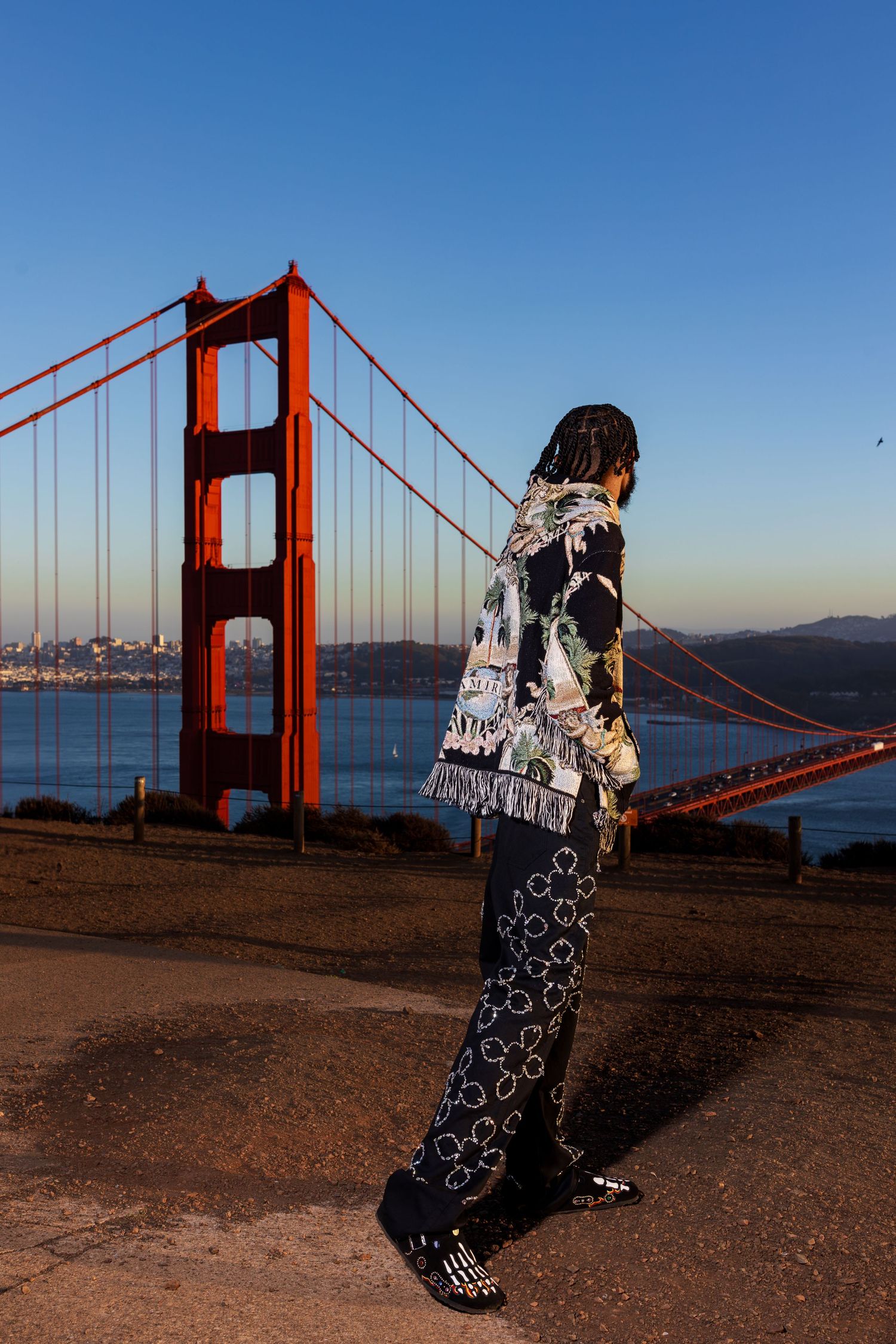 Artistic fashion shots with the Golden Gate Bridge and San Francisco Bay as backdrop.