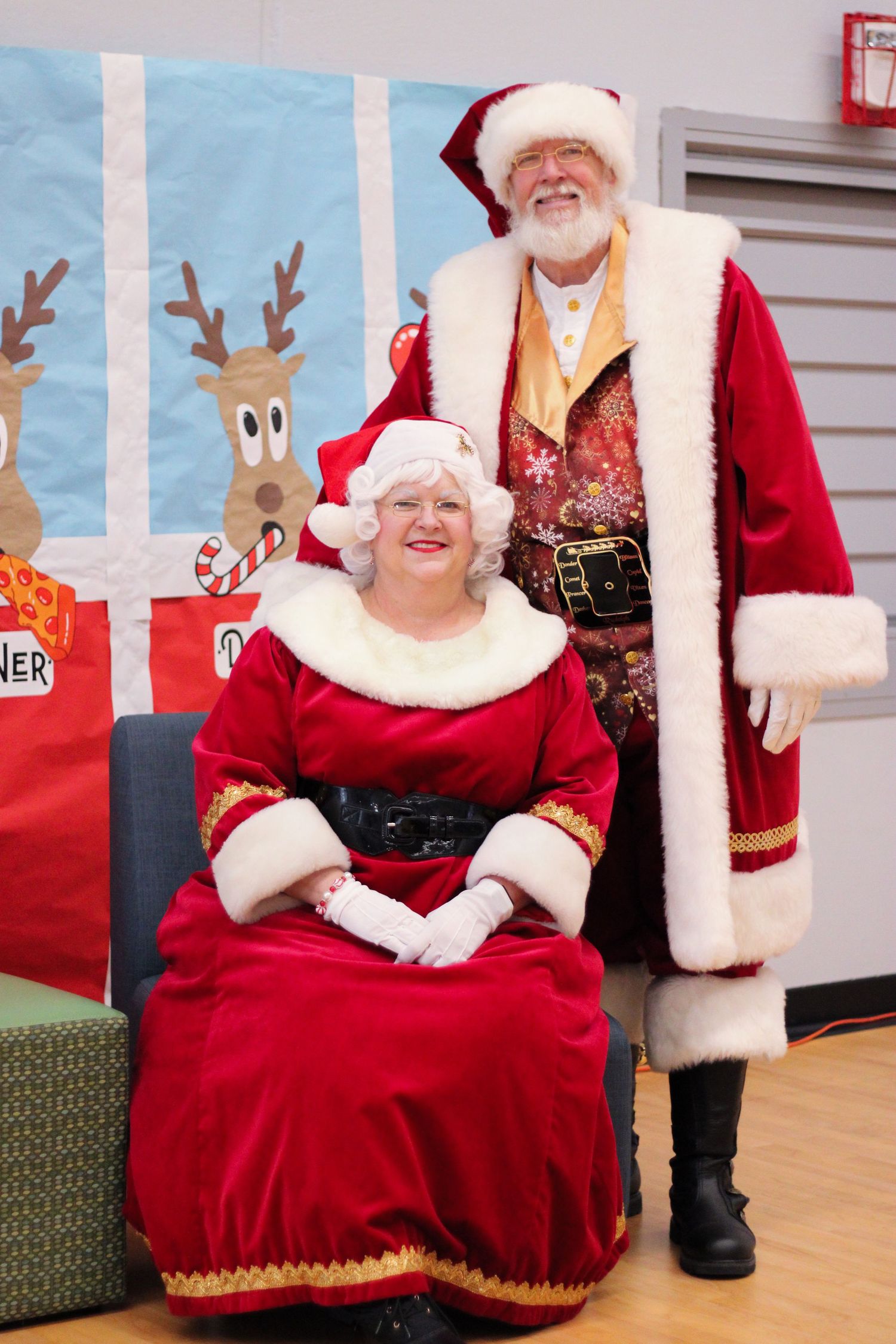 Portrait of Santa Clause and Mrs. Clause visiting Delaware Elementary School in Springfield, Missouri