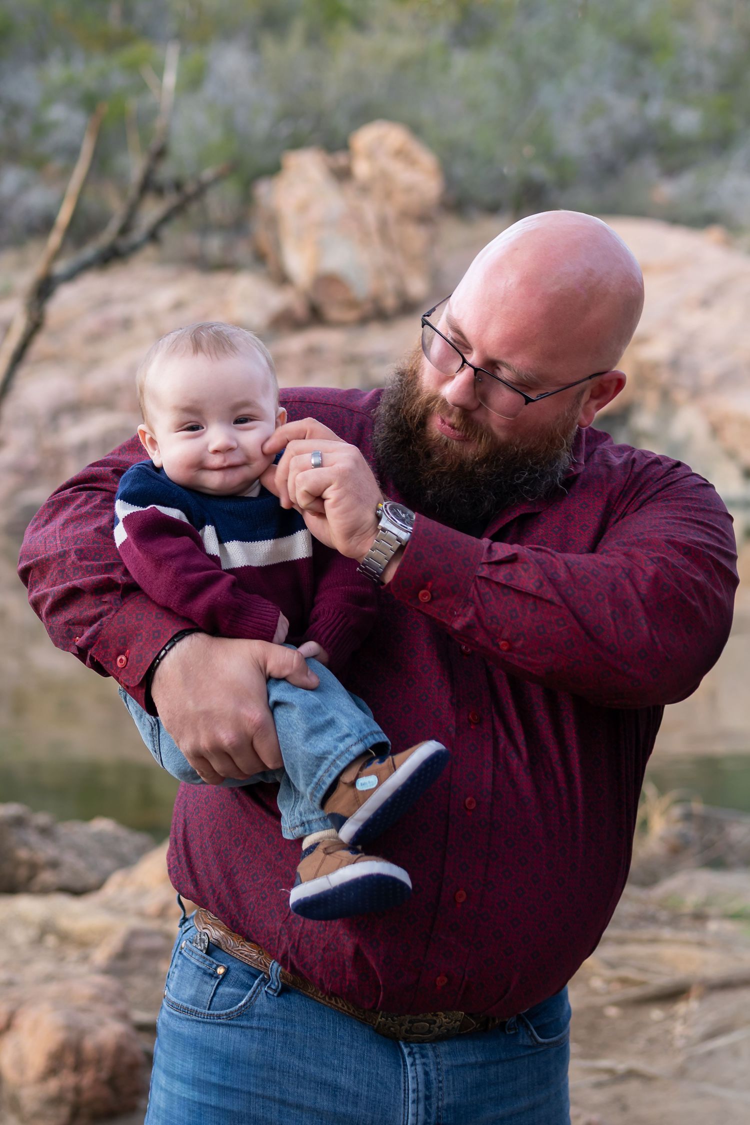 A series of candid outdoor photos showing playful interaction between an adult and baby against a natural backdrop.