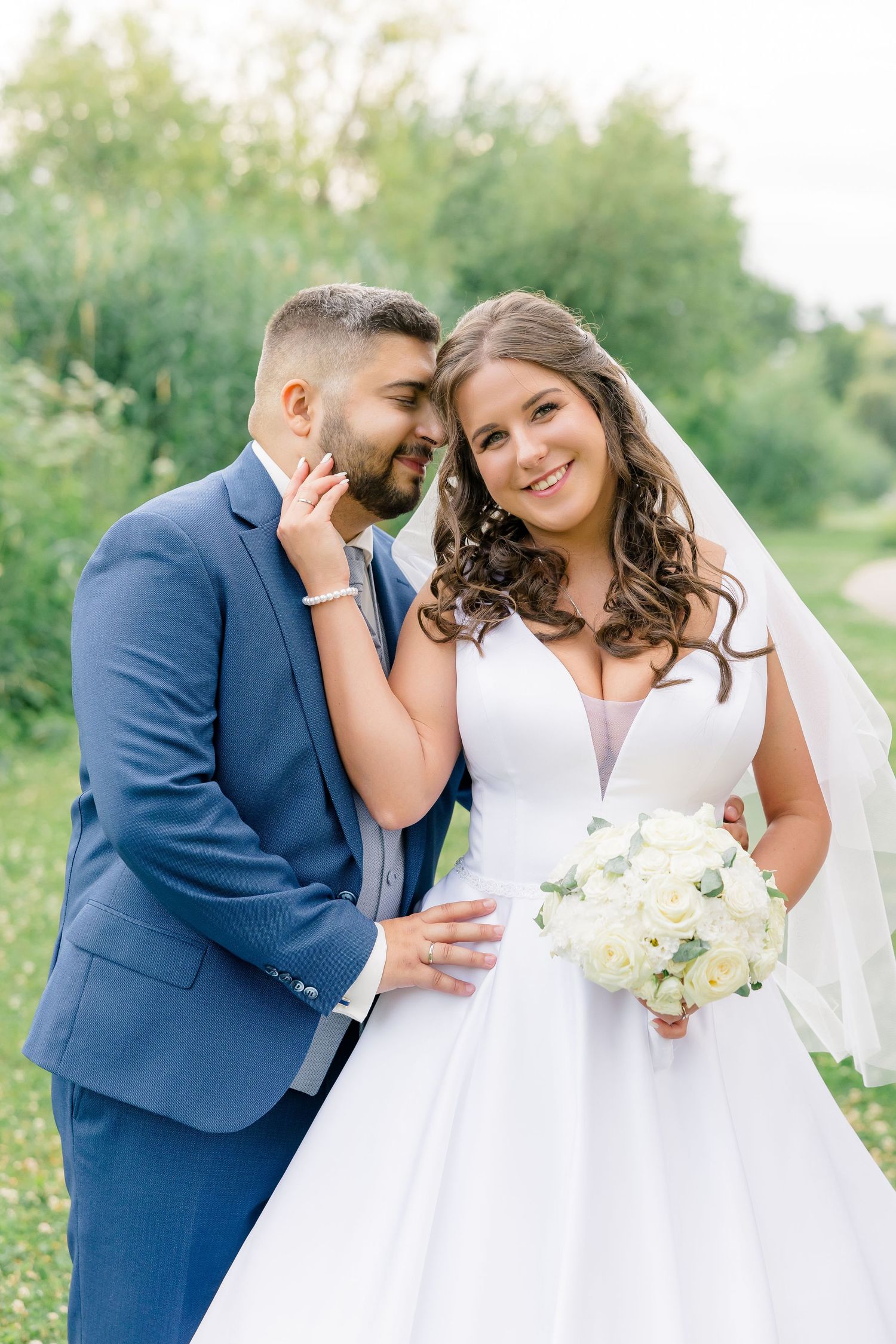 A happy bride and groom share intimate moments outdoors in a collage of romantic wedding photos.