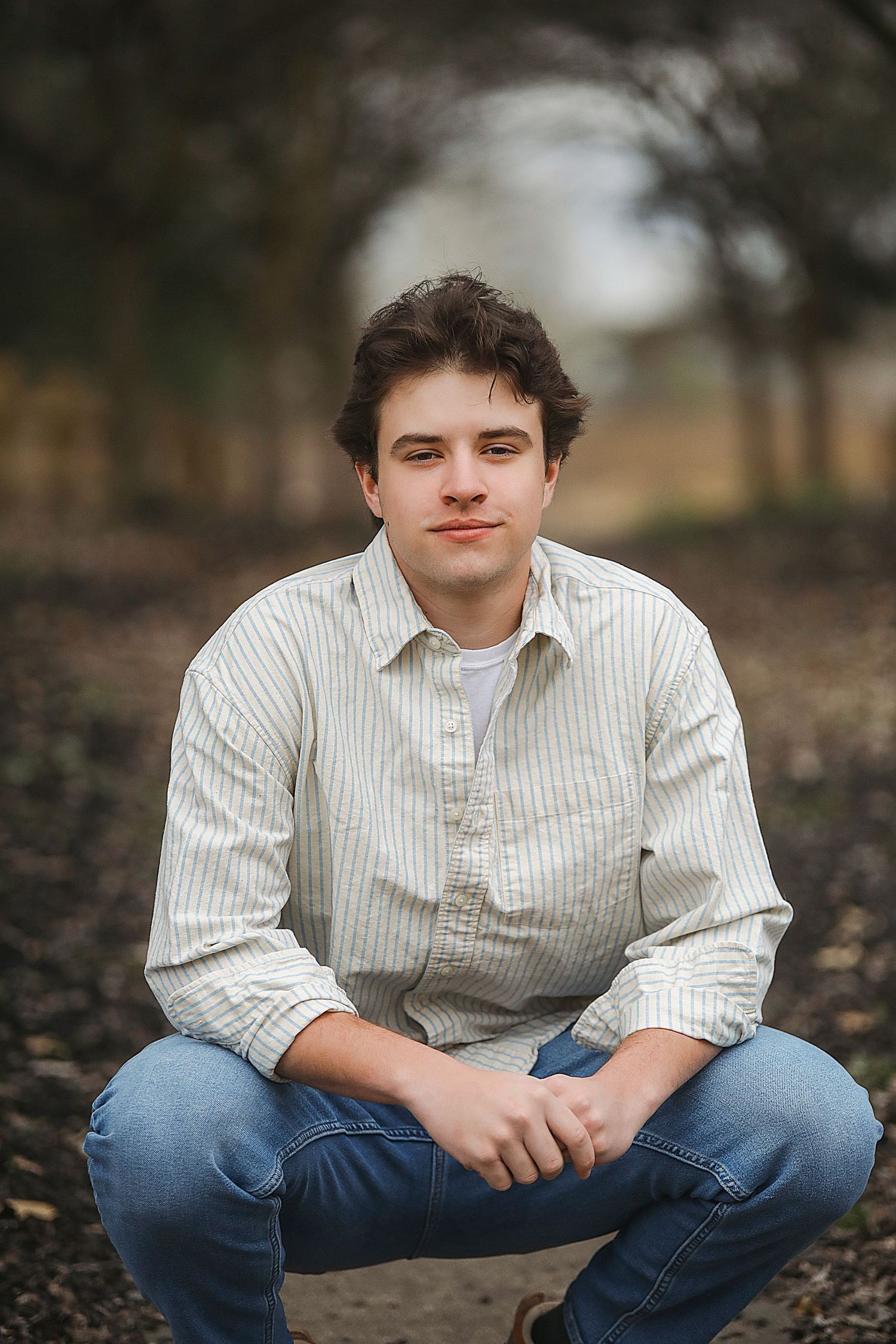 A series of portrait shots showing a person in a white striped shirt and jeans sitting outdoors.
