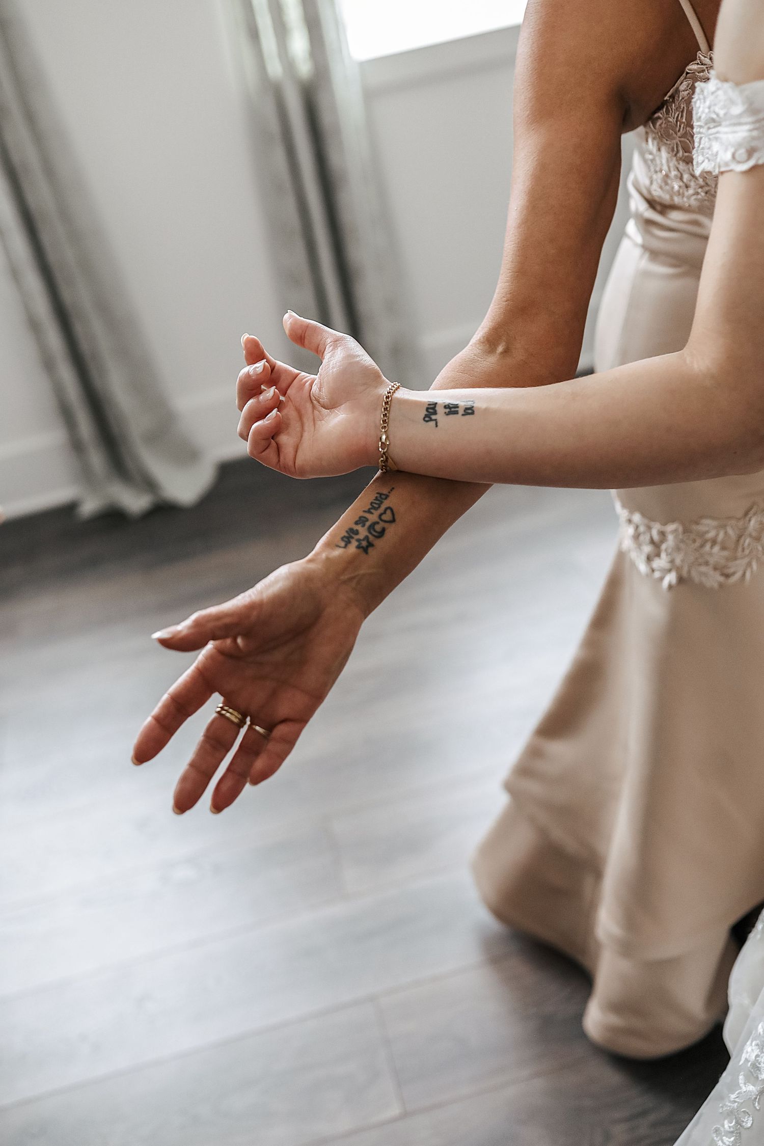 A series of cropped shots showing hands in graceful dance-like movements against a light background.