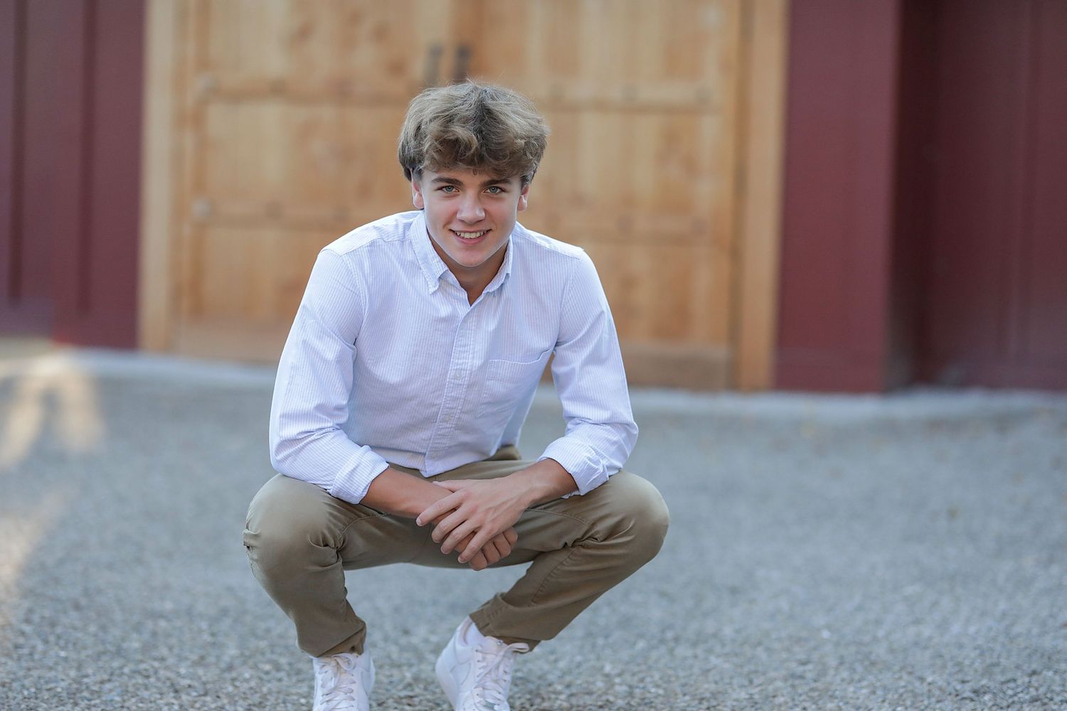 Multiple photos of someone sitting outside on concrete steps in a casual outfit at sunset.