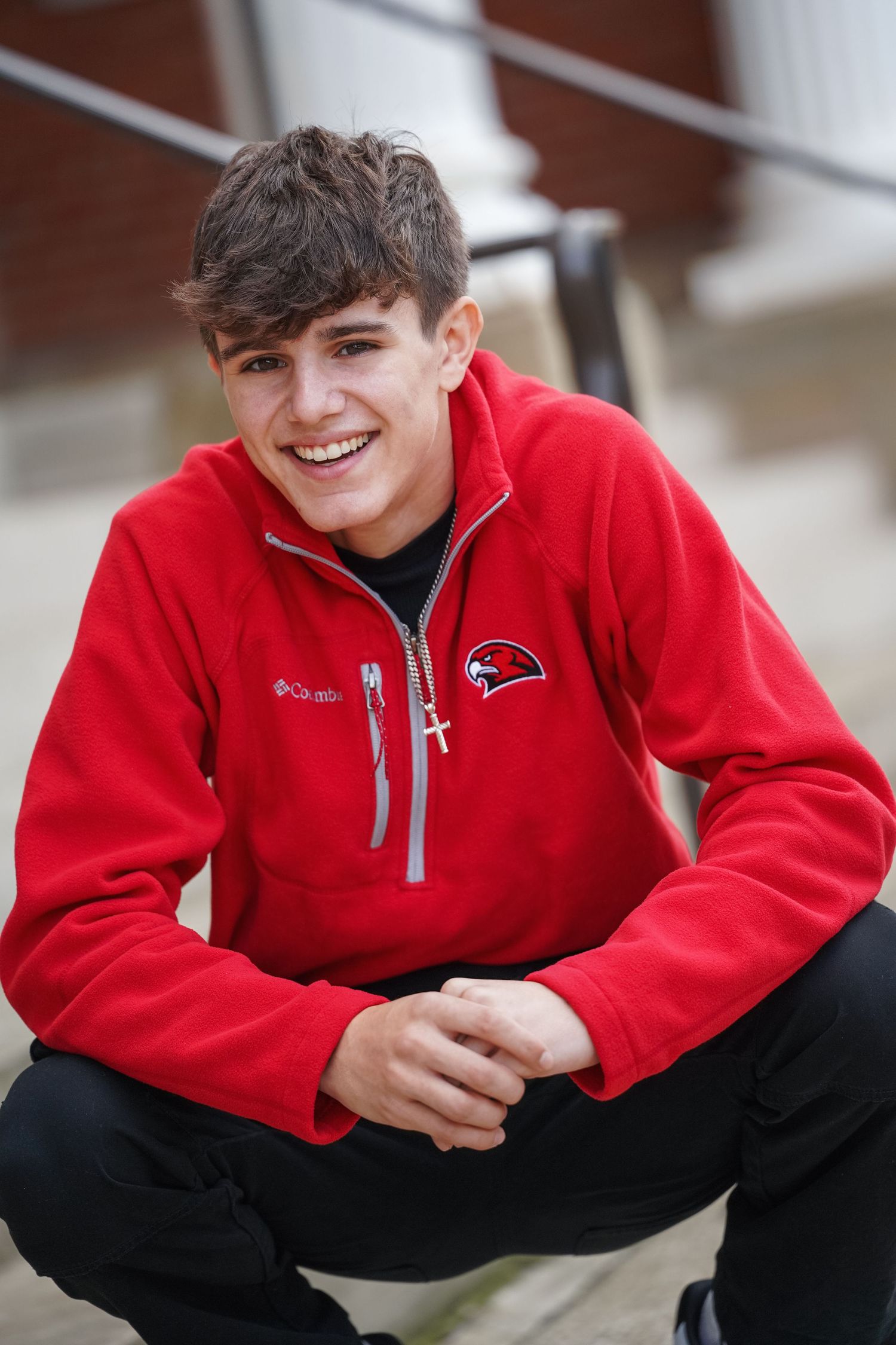 Sequence of portraits showing person wearing red zippered sweatshirt against blurred background.