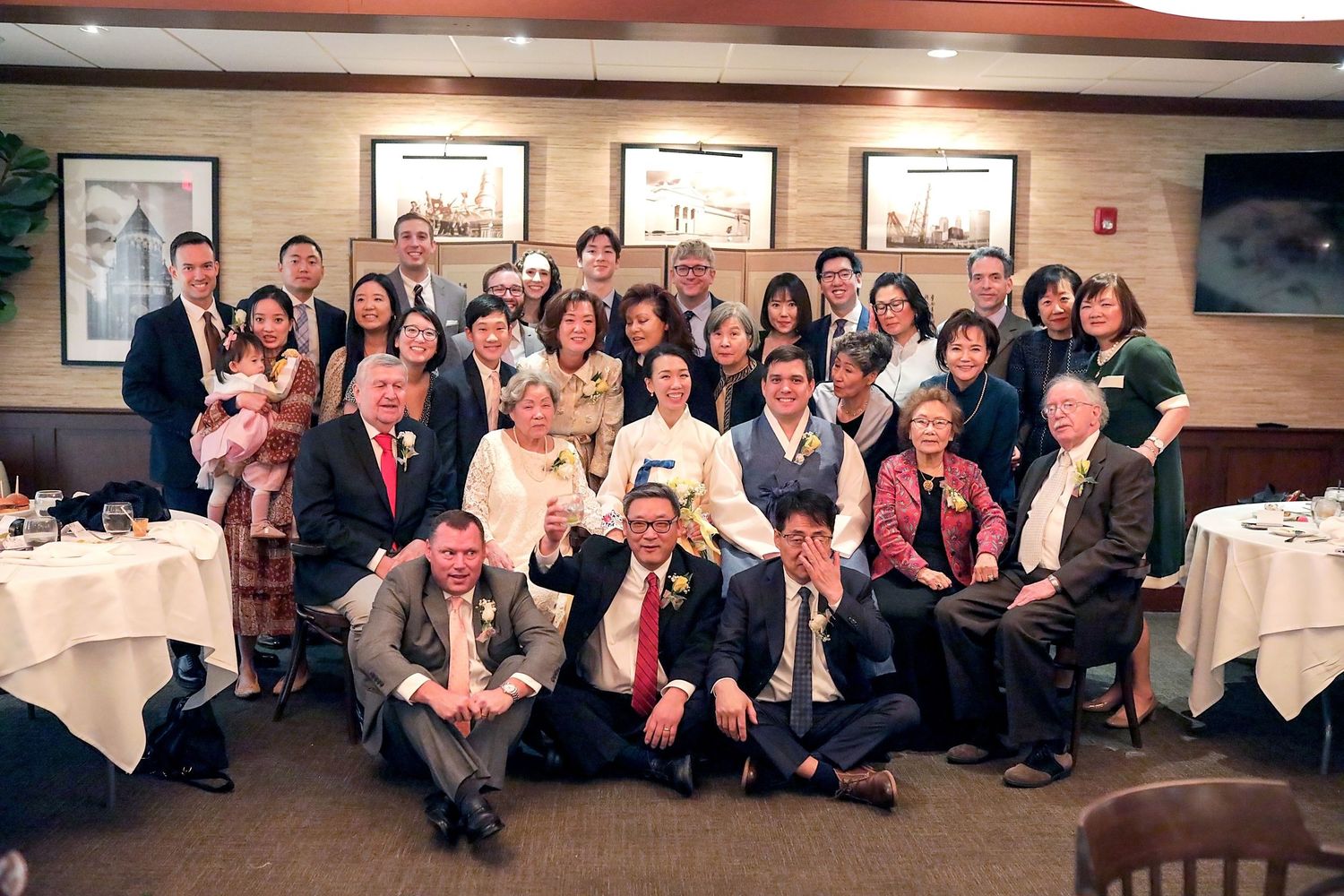 A series of group photos showing people sitting at tables and standing together at what appears to be a banquet event.