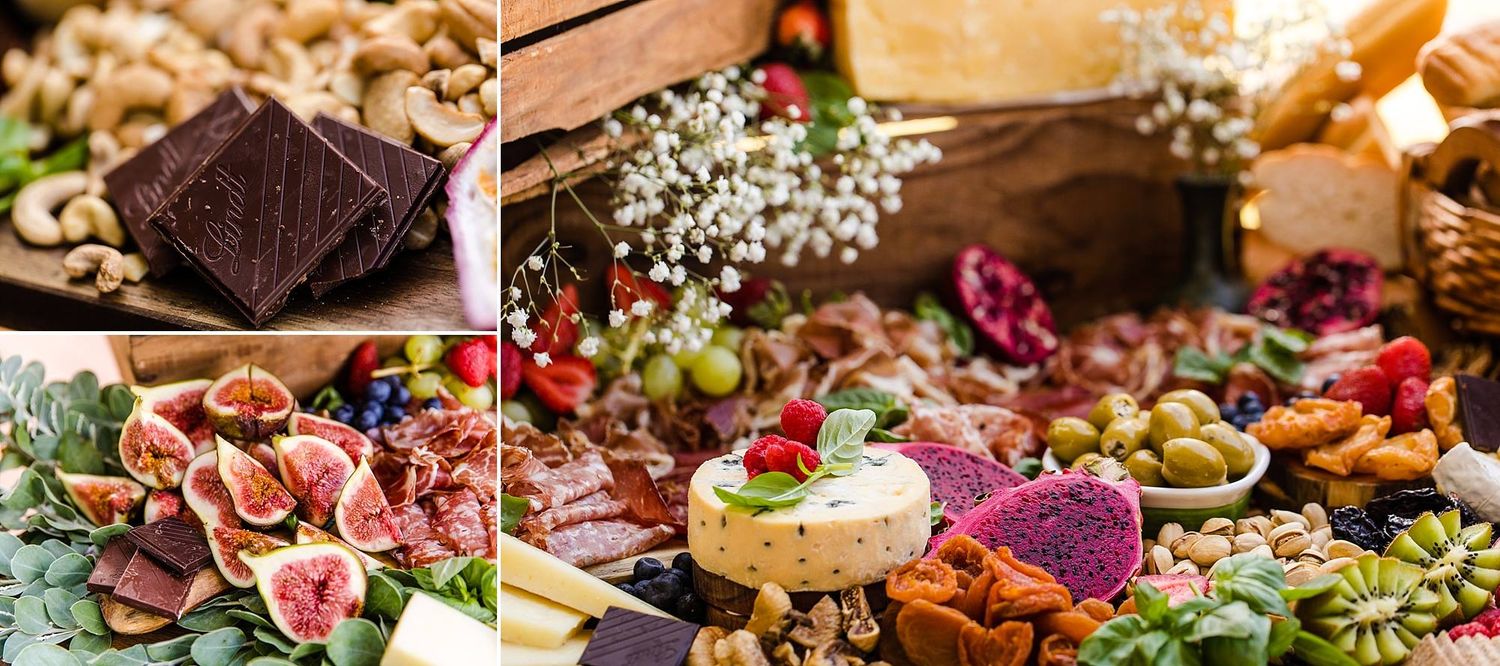 Elegant party platter spread featuring charcuterie, cheeses, fresh fruits, and decorative floral elements.