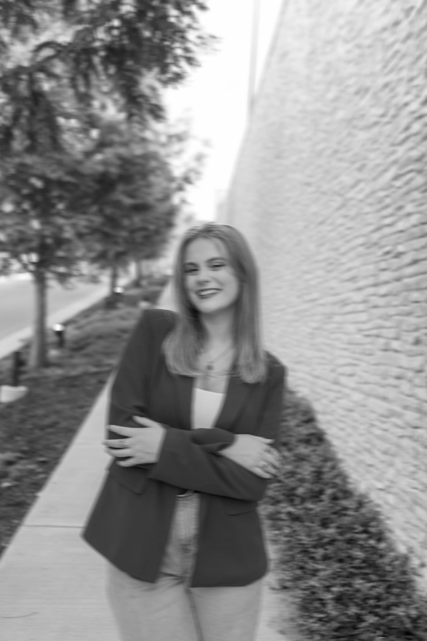 Black and white Modern woman blurry branding photo in park-setting