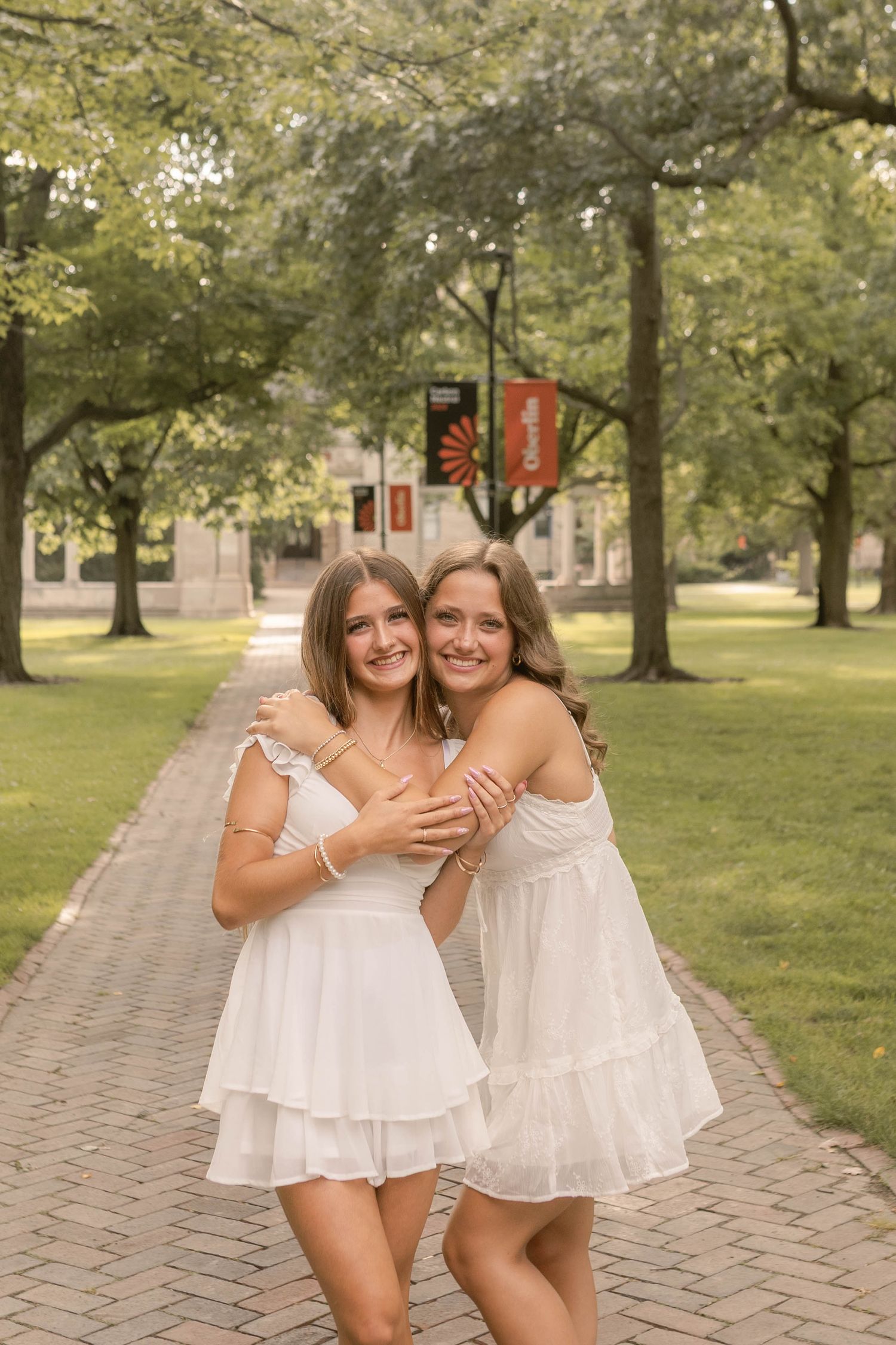 Best friend senior photos outdoors during sunset at park