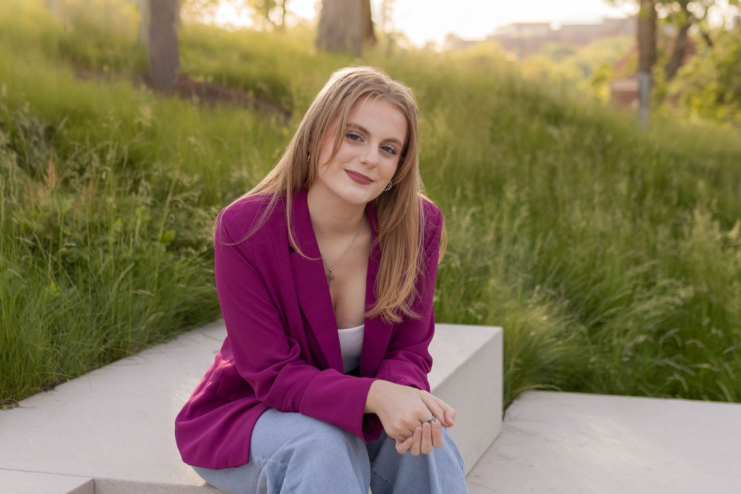 Modern woman branding photo in park-setting during golden hour