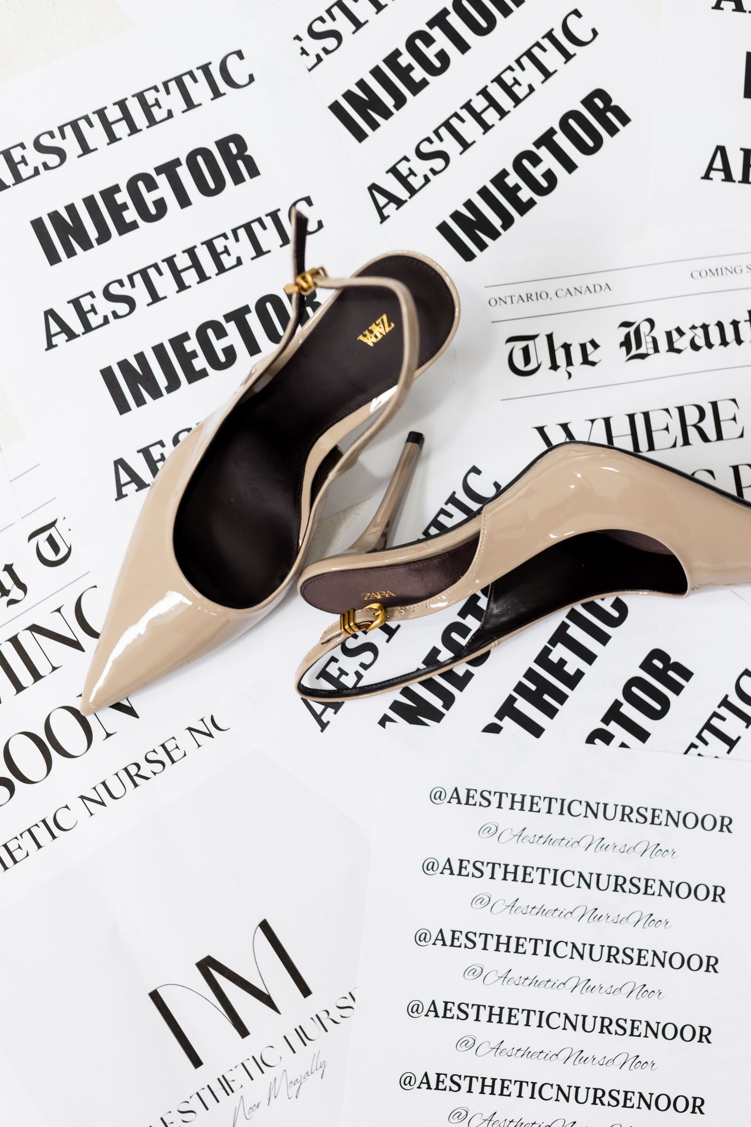 Stylish beige high heel shoes displayed with aesthetic nurse text and branded labels against a white background.
