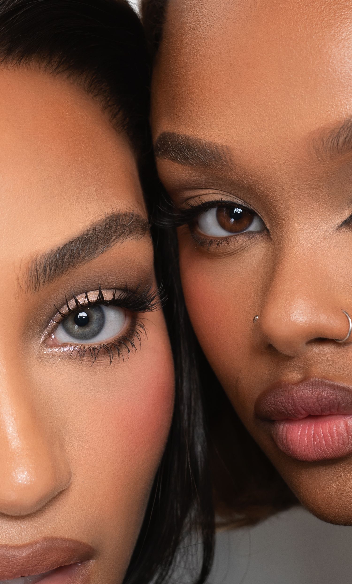 Close-up beauty shot showing flawless makeup and glowing skin.