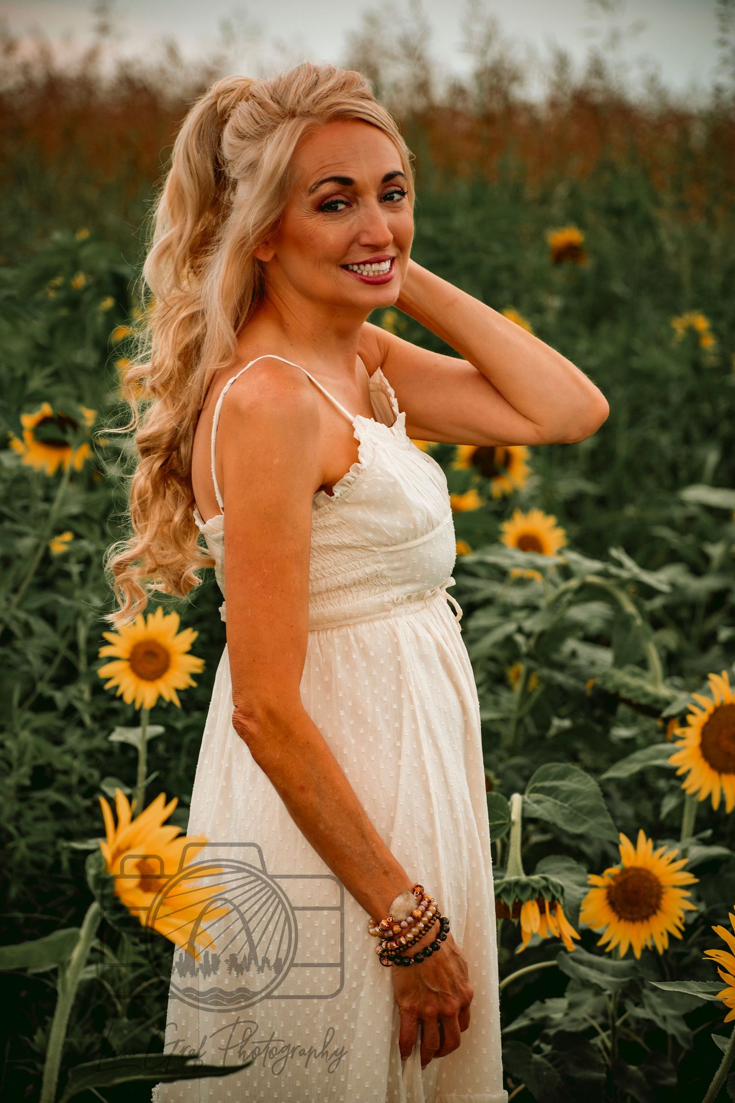 A St. Louis City photographer who focuses on Family Lifestyle and Pet Photography. Sunflower minis at Columbia Bottom Rock Reservation