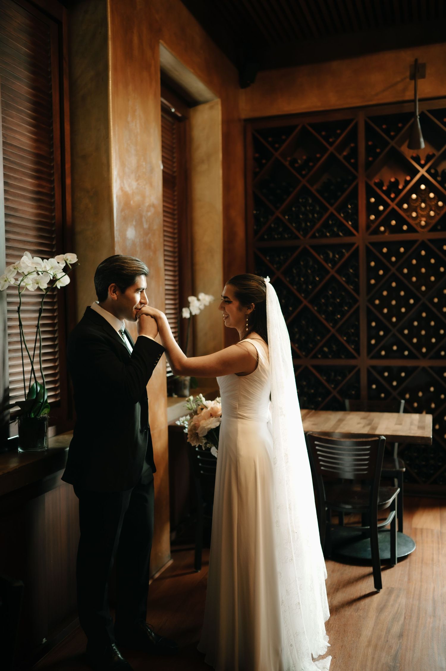 Romantic dance sequence in a rustic wine cellar with wooden details.