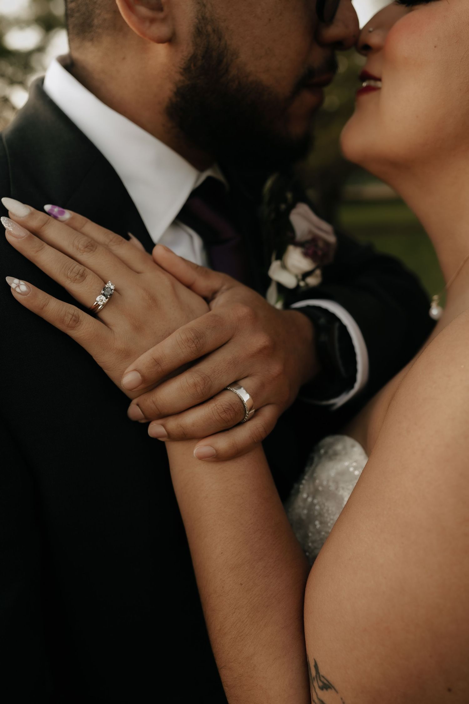 Close-up shots of wedding rings and tender moments between the couple.