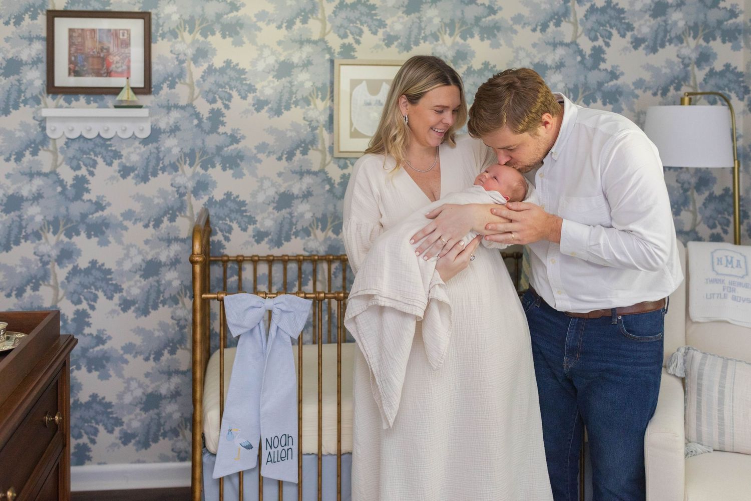 A nursery room with blue floral wallpaper  - Atlanta Newborn Photography