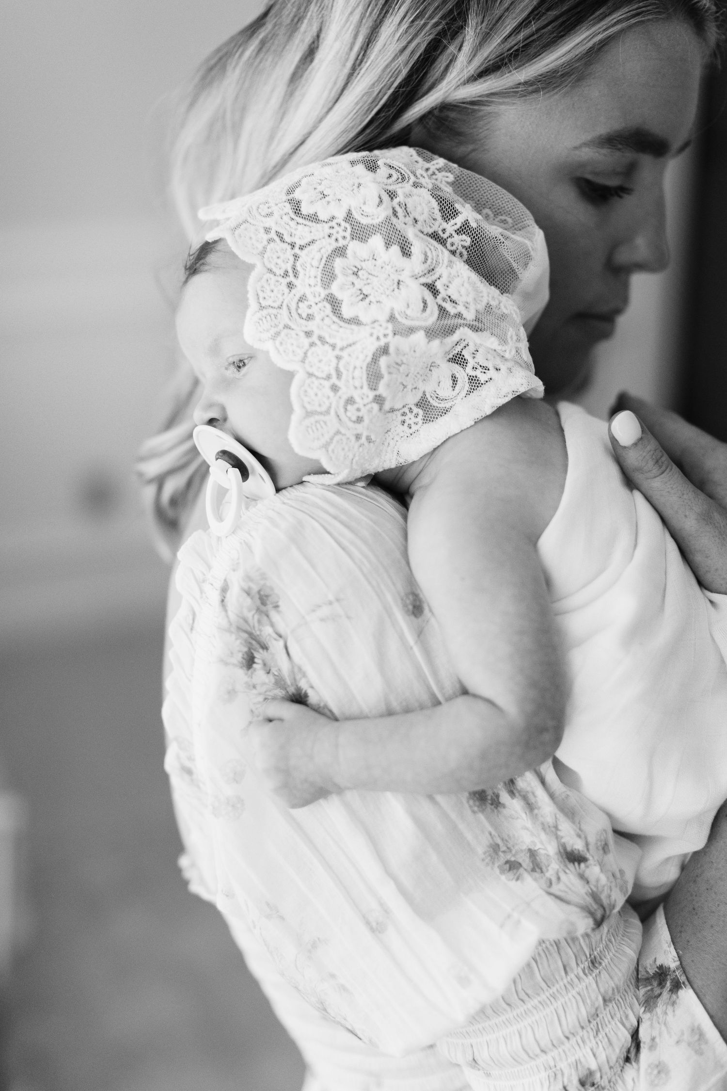 Black and white intimate portrait with delicate lace details.