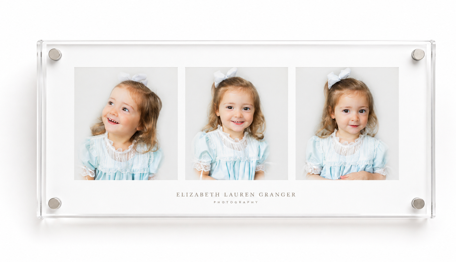 Acrylic frame displaying three portrait photos of a young girl in a blue dress, with name text below.
