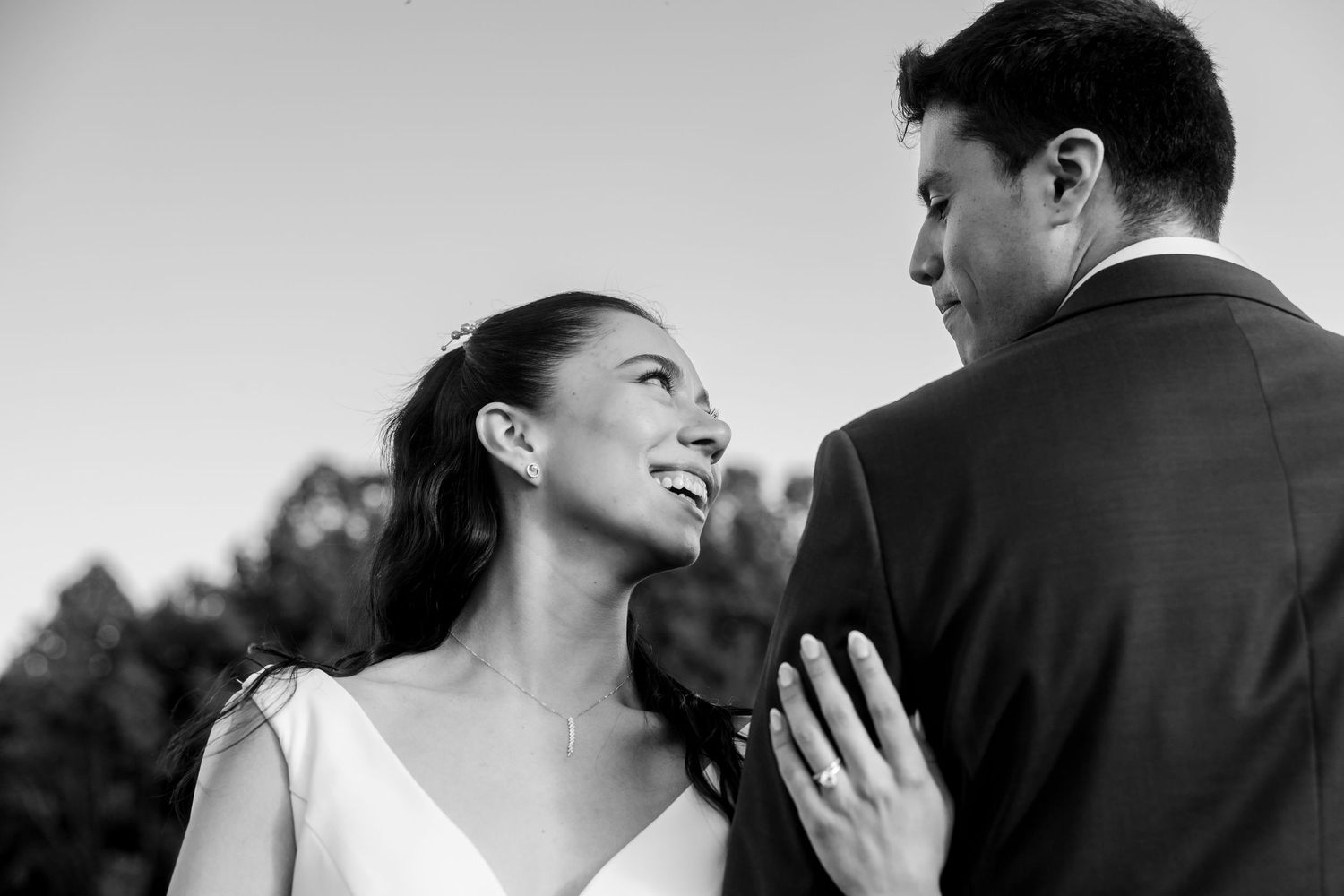 A black and white photo of a wedding couple
