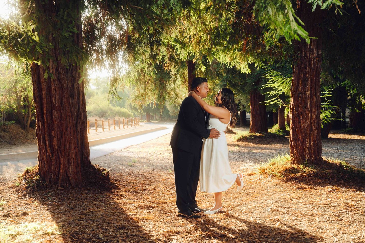 Bride and groom-to-be laughing in engagement photography session