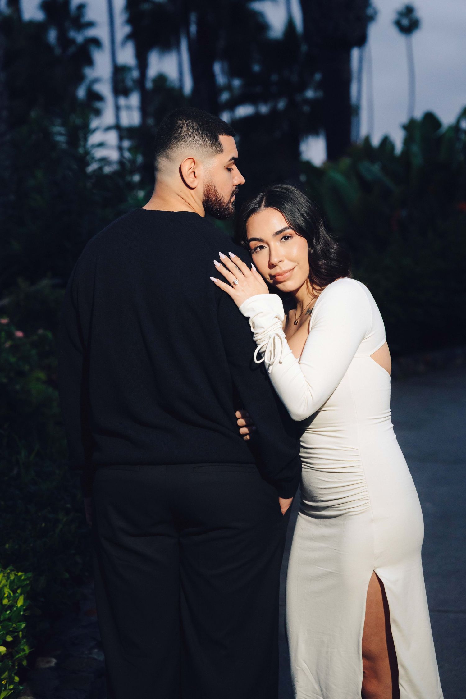 Couple posing for a photo in heisler park located in laguna beach