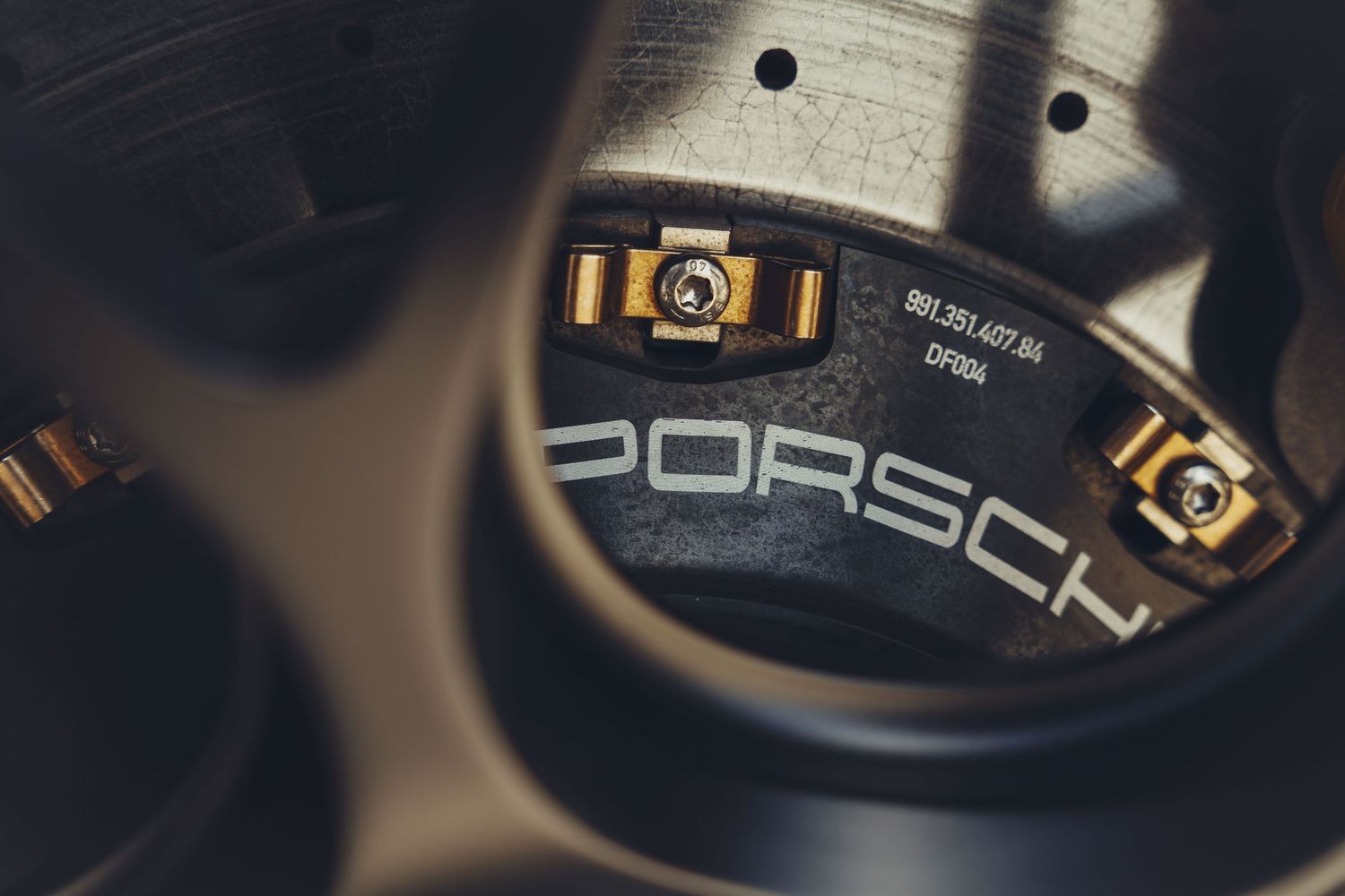 porsche wheel up close getting the wording of the porsche rotors