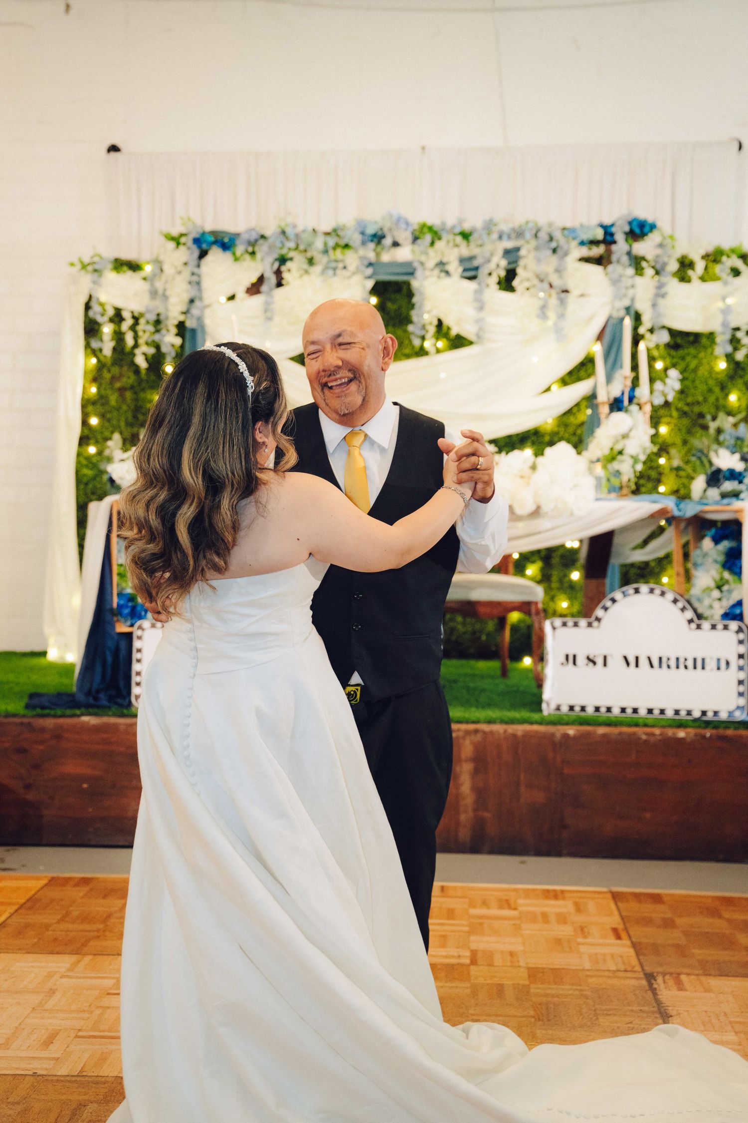 father and daughter dance for wedding party located in commerce California venue