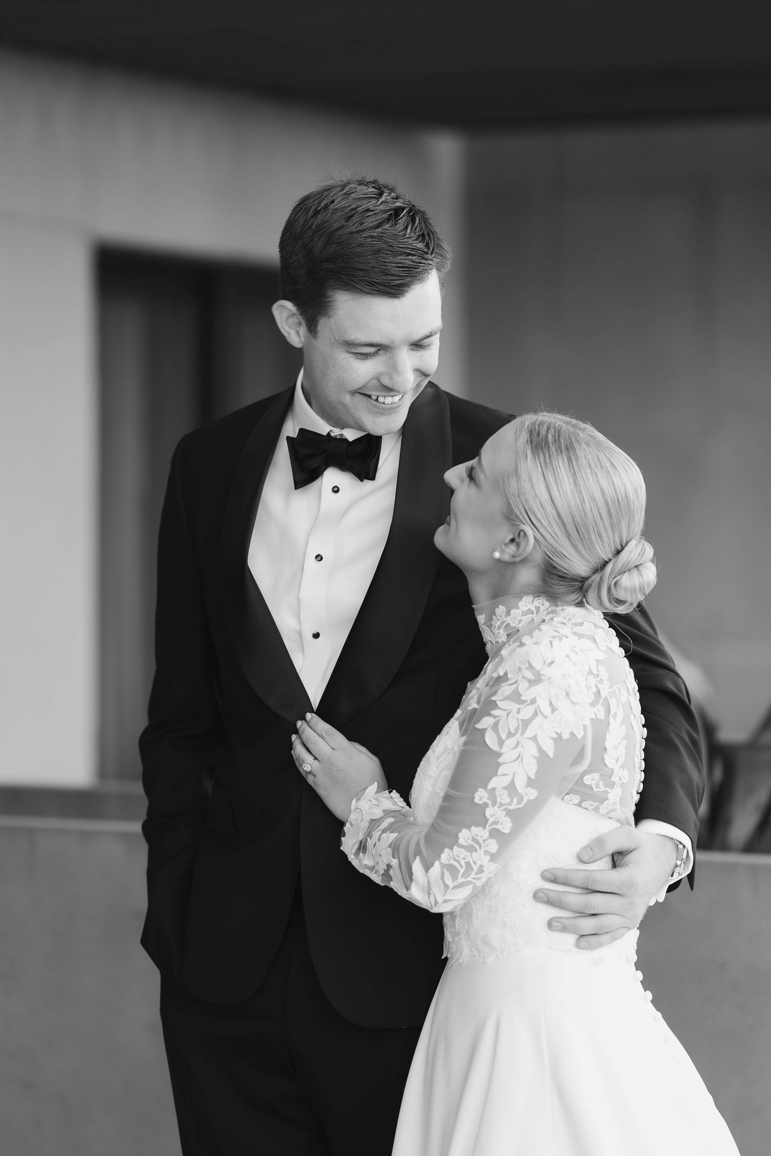 A romantic black and white sequence of a couple sharing intimate moments during their wedding celebration.
