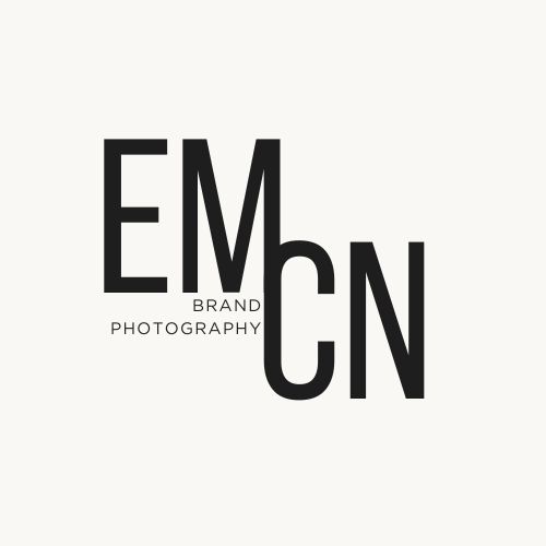 Modern black typography logo design for EMCN Brand Photography with stacked letters in minimalist style.