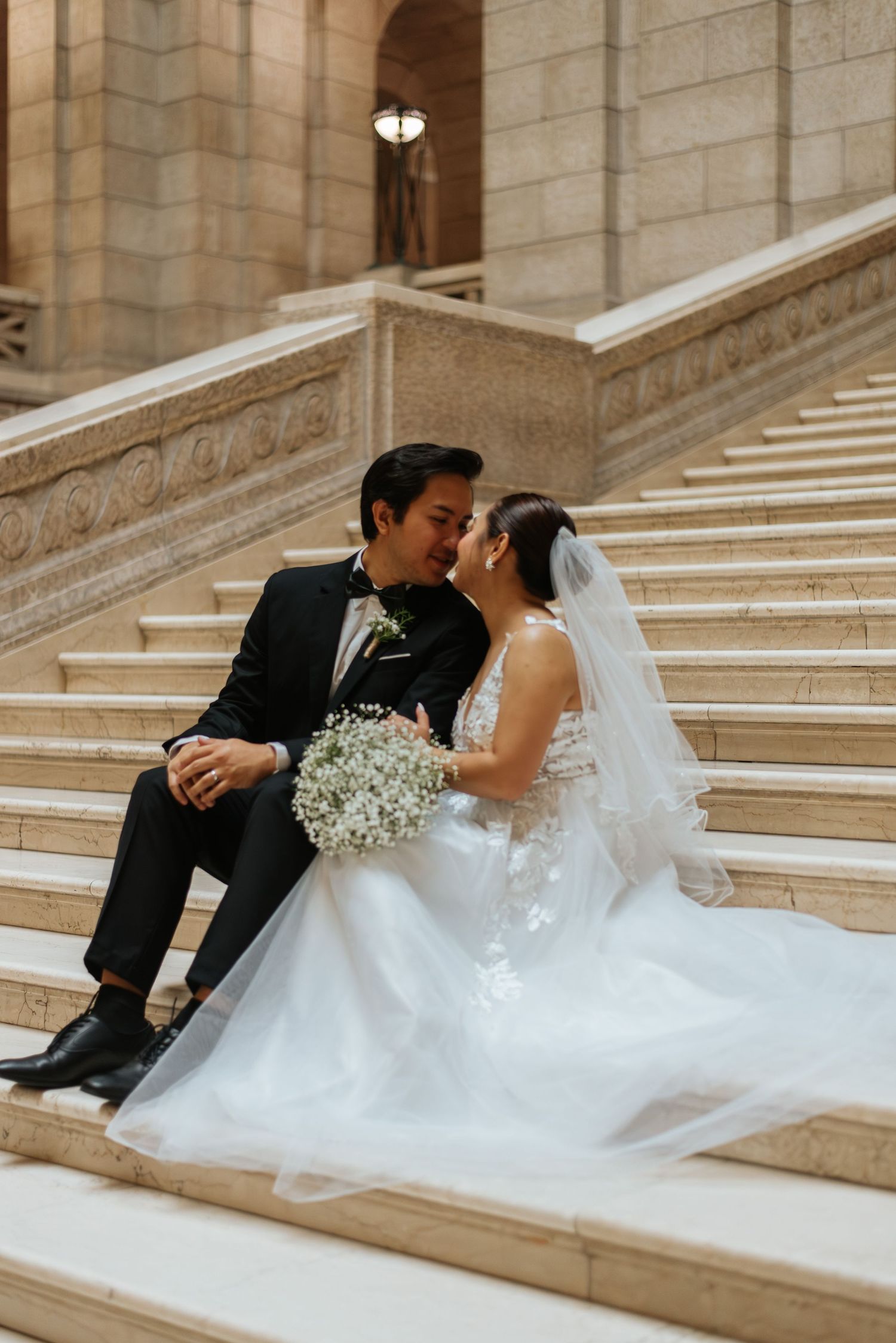 bride and groom kiss