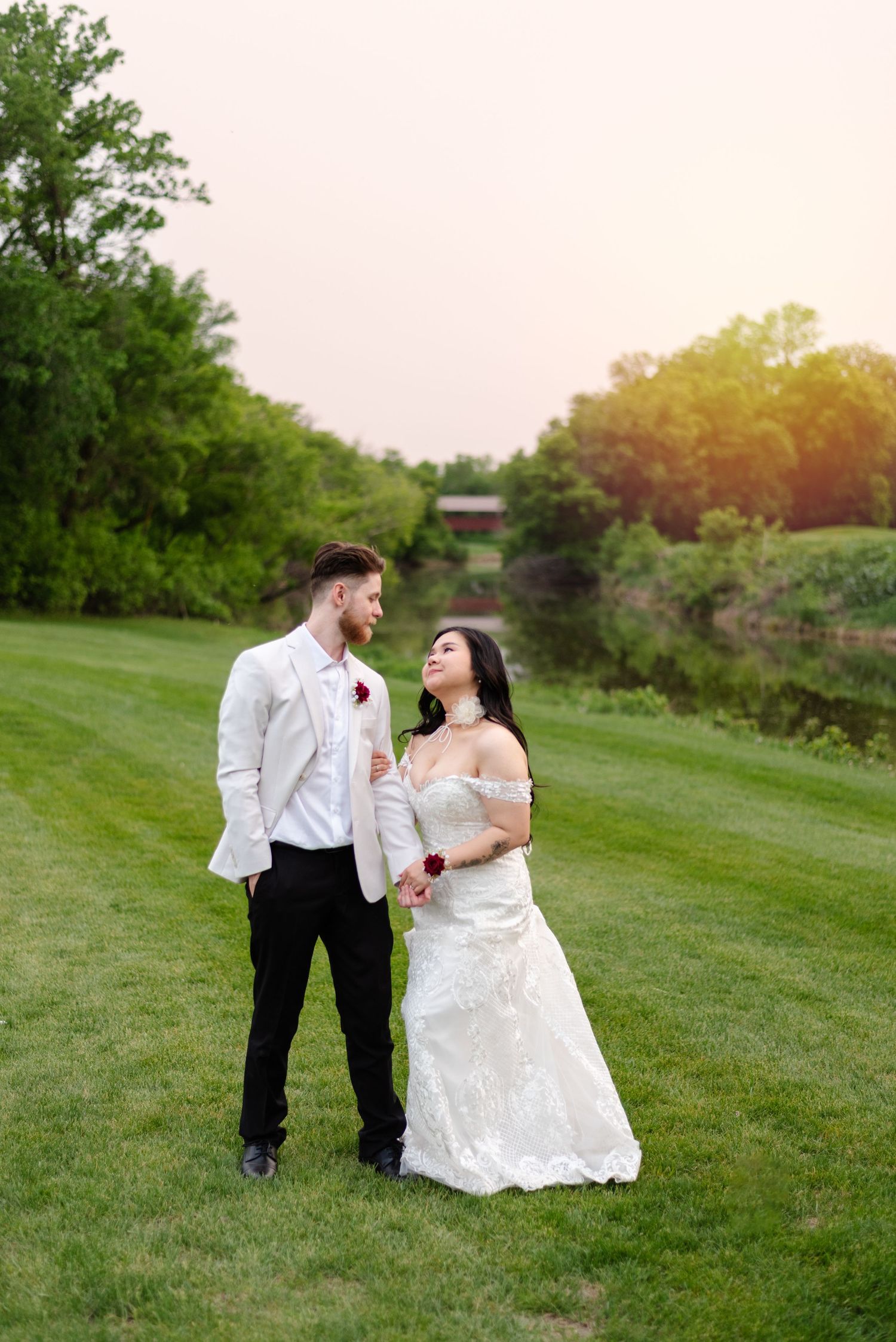A couple looks at each other on their wedding day