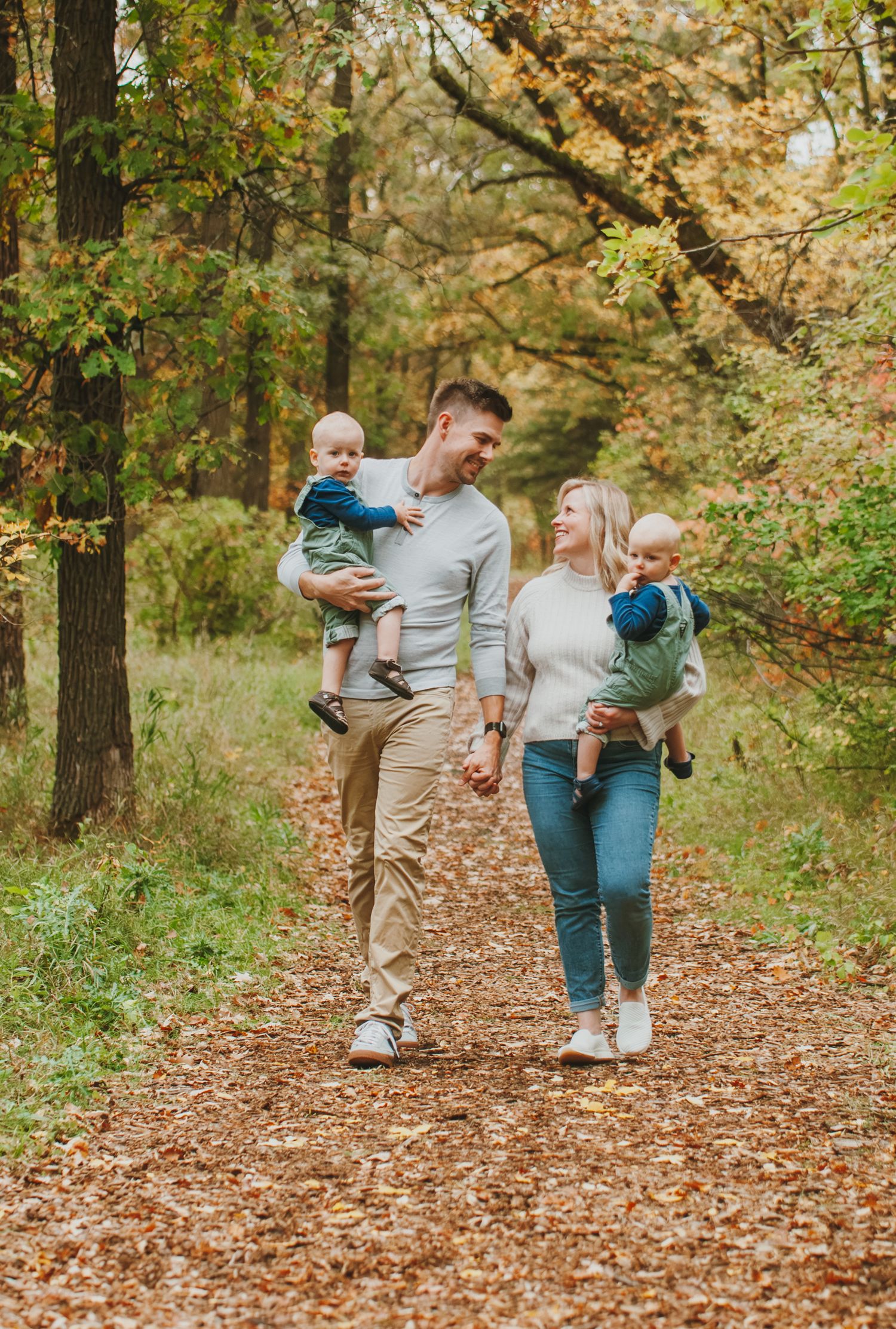 Family walkingin park in the fall