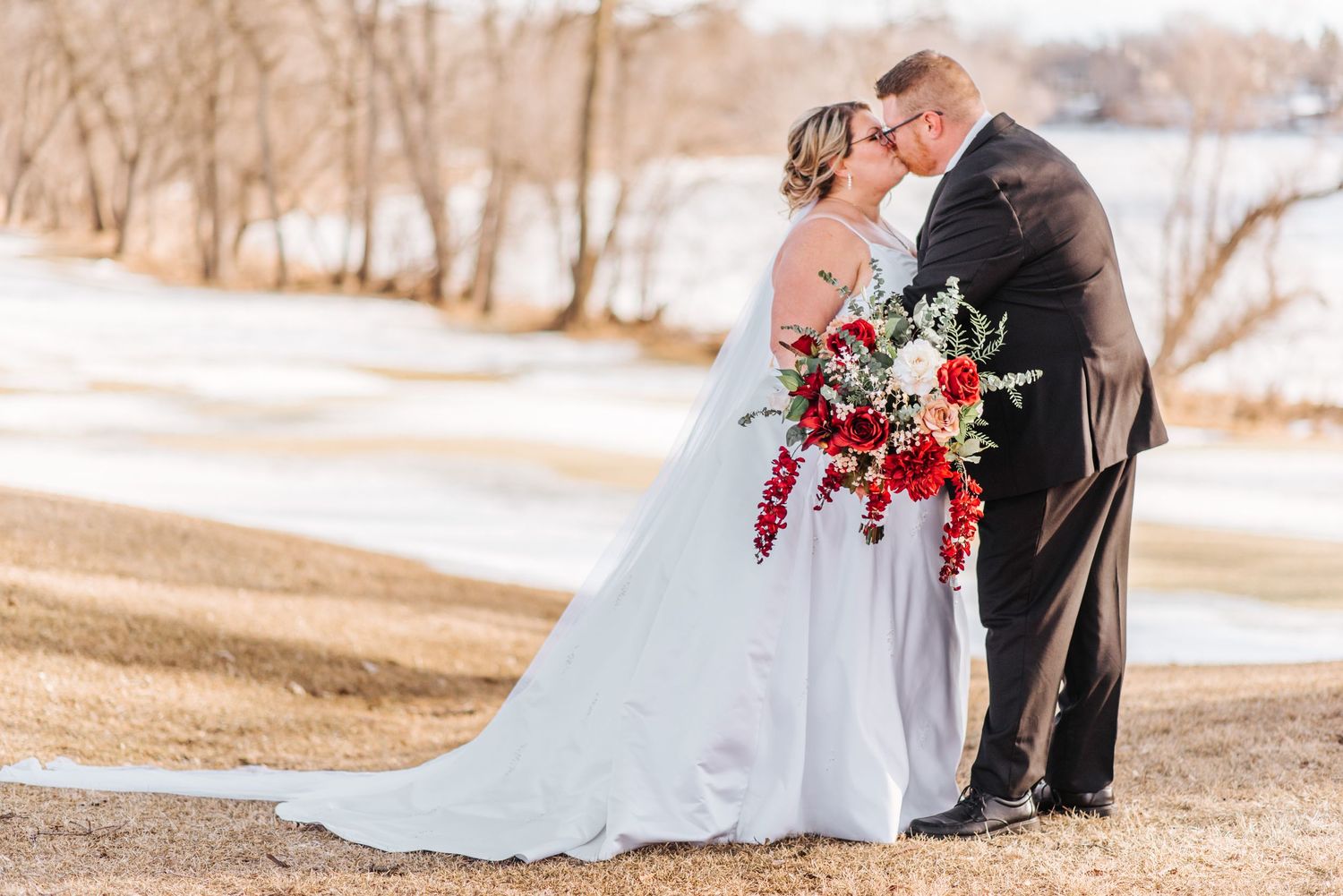 Couple kiss on wedding day