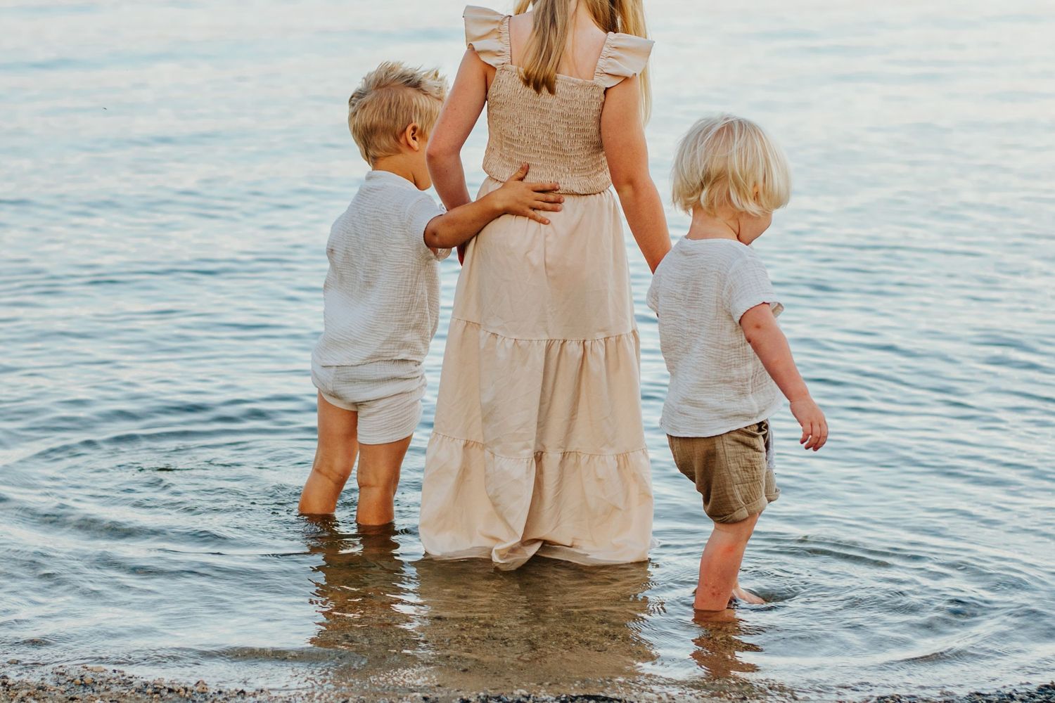 Children play in water during photoshoot