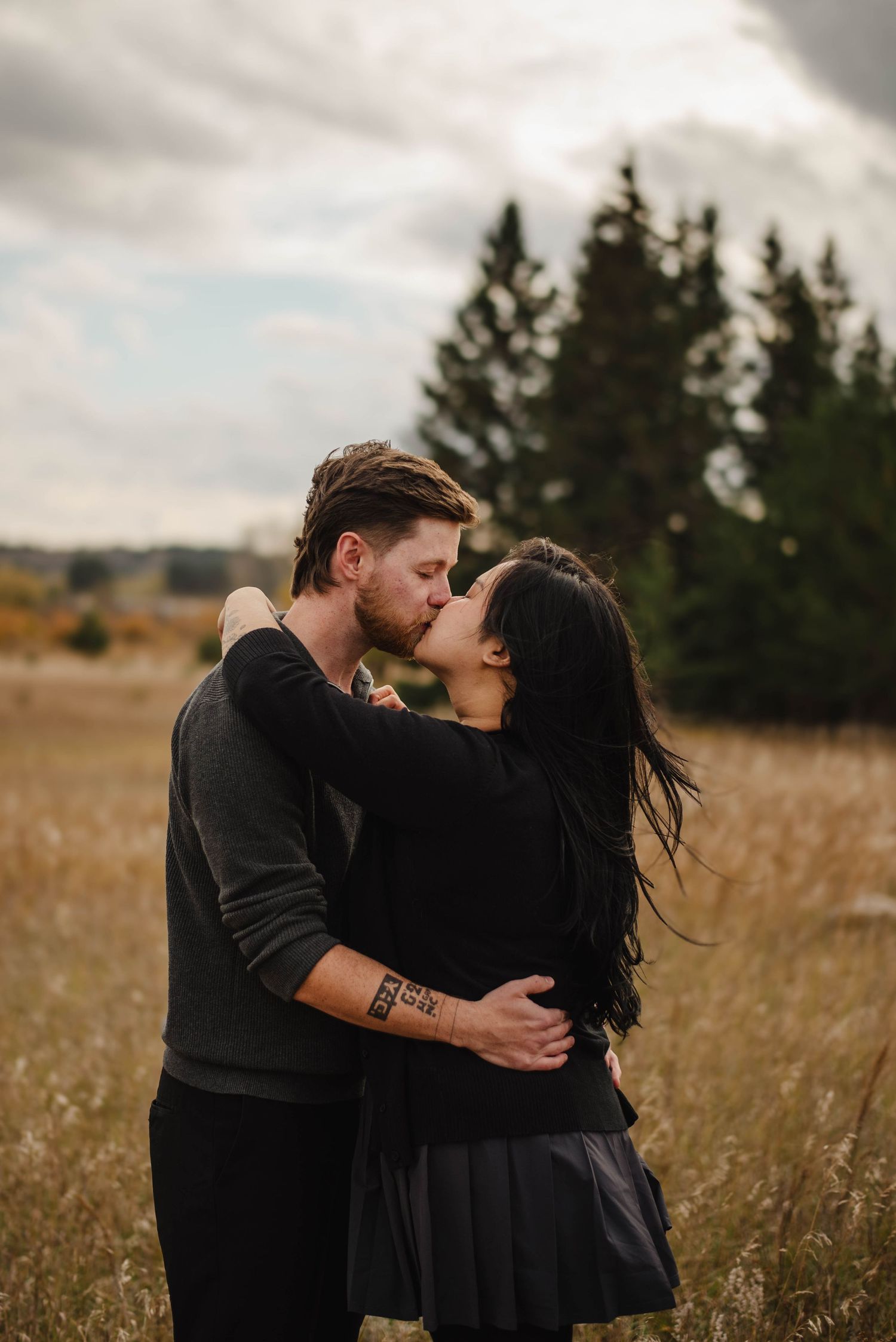 man and woman kiss