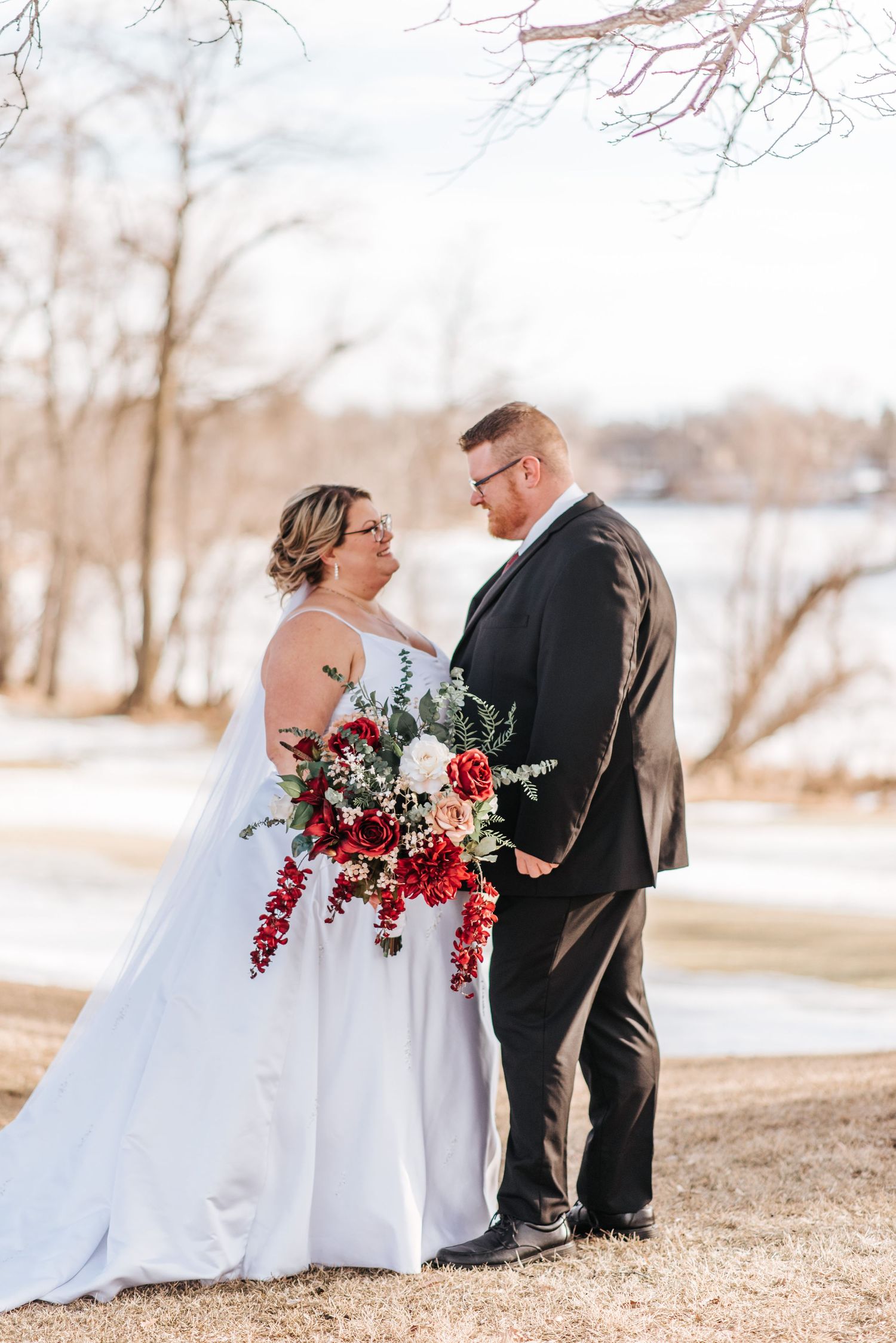 Couple look at eachother on wedding day