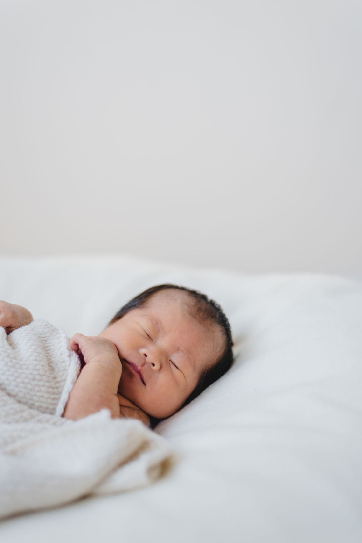 Minimalist photo of newborn baby