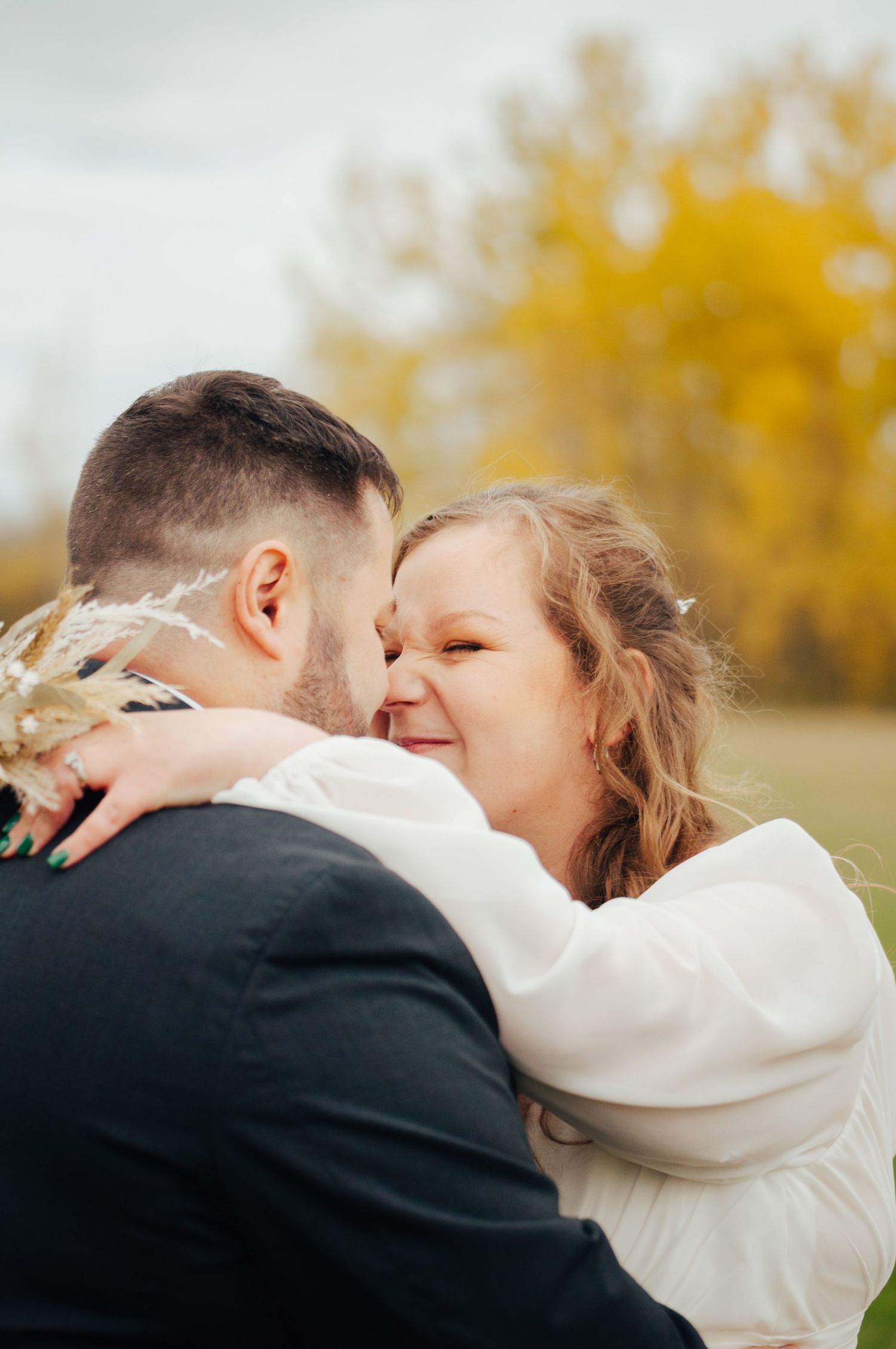 Couple kissing on wedding daay