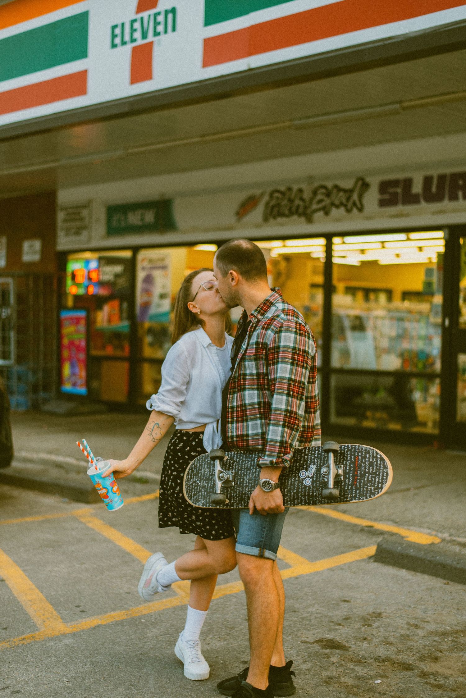 Couple kiss outside 711