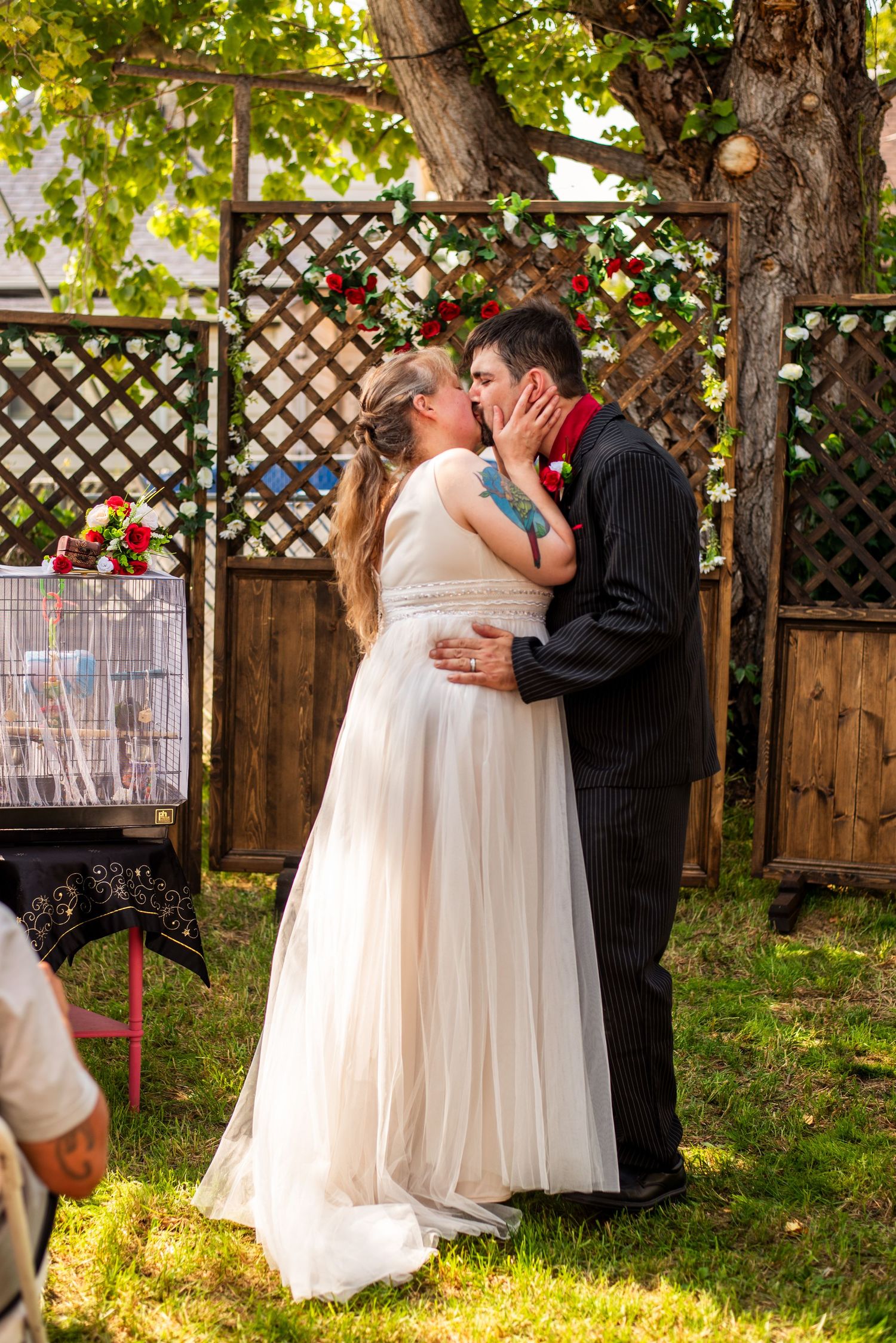 Couple kiss on wedding day