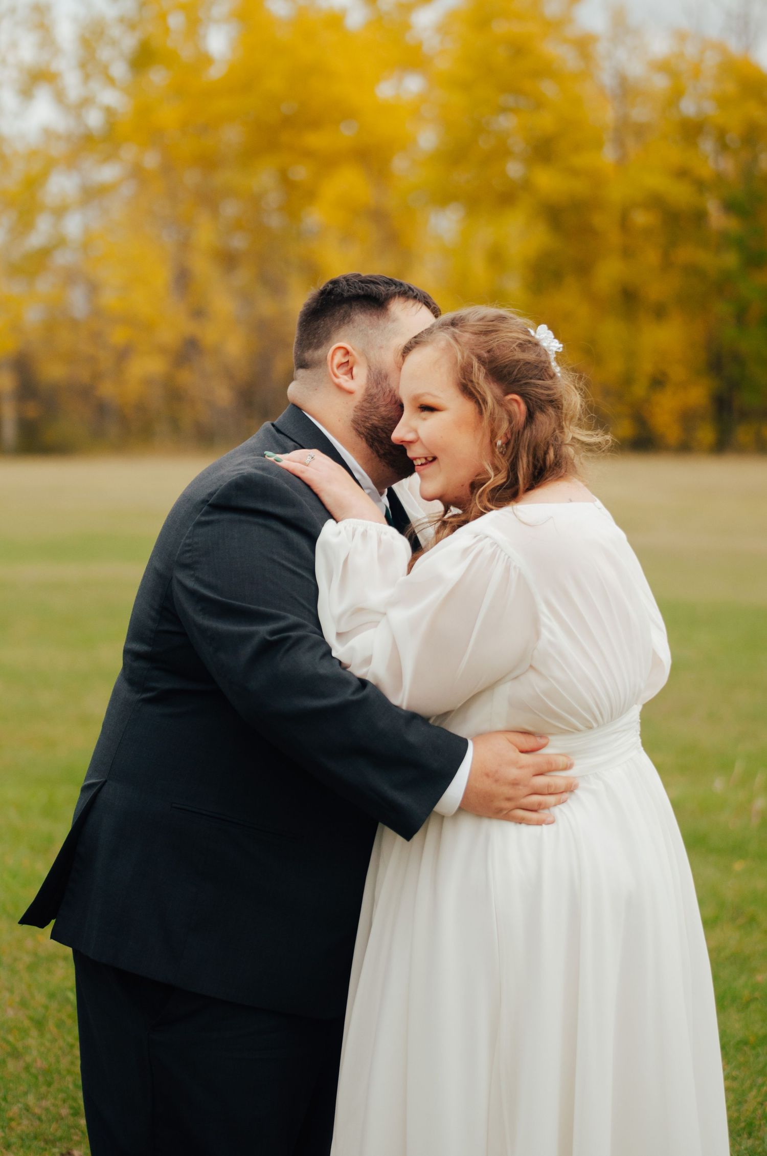 Couple kissing on wedding daay