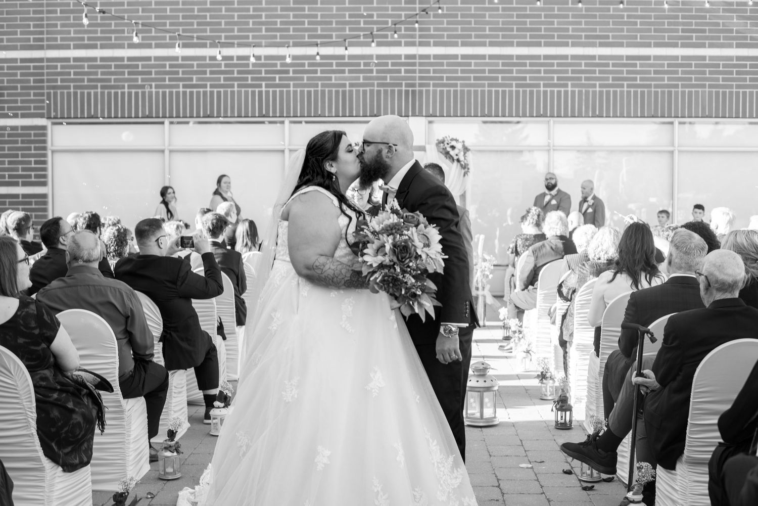 Couple kiss mid exit