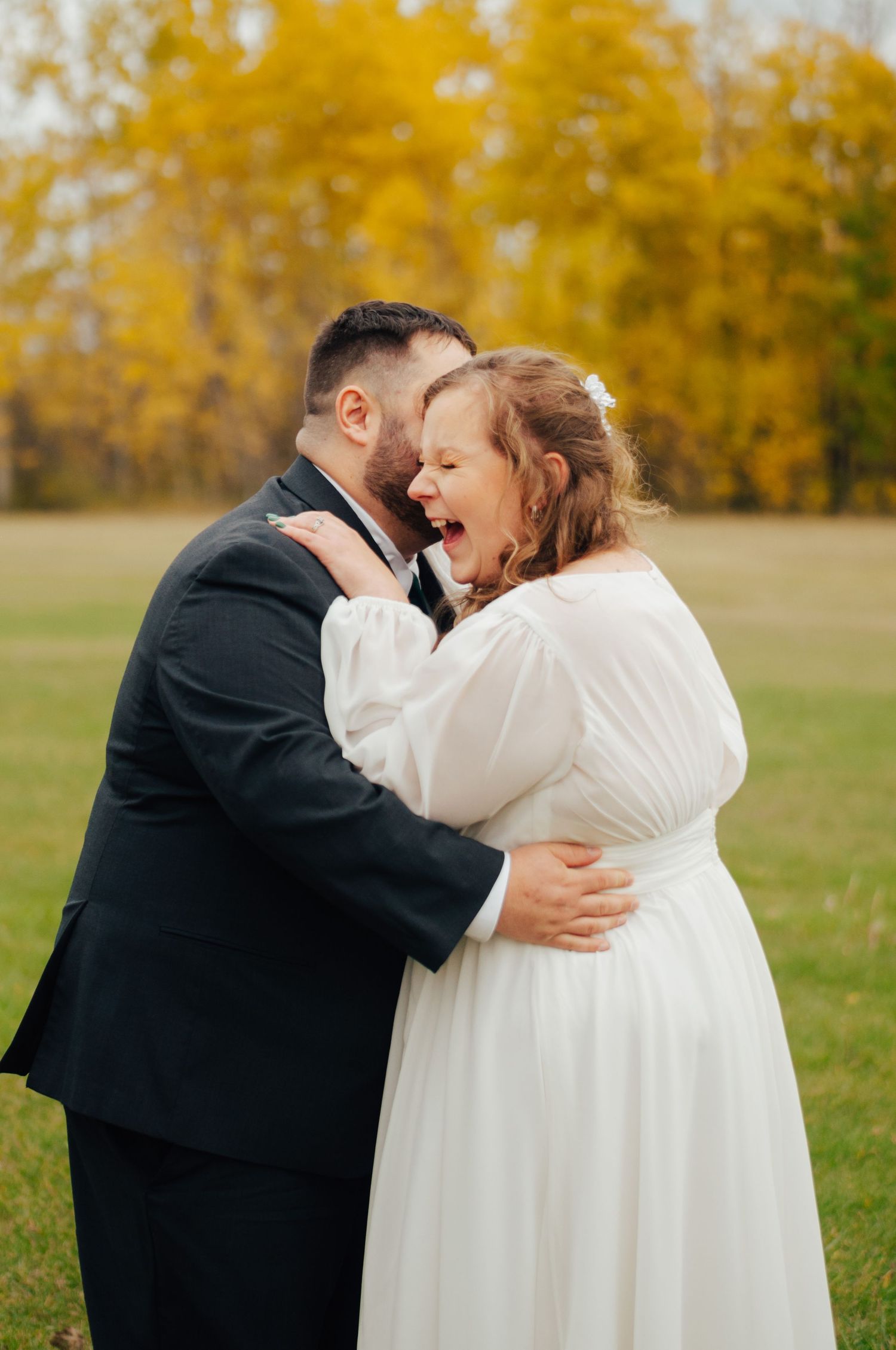 Man makes woman laugh on wedding day