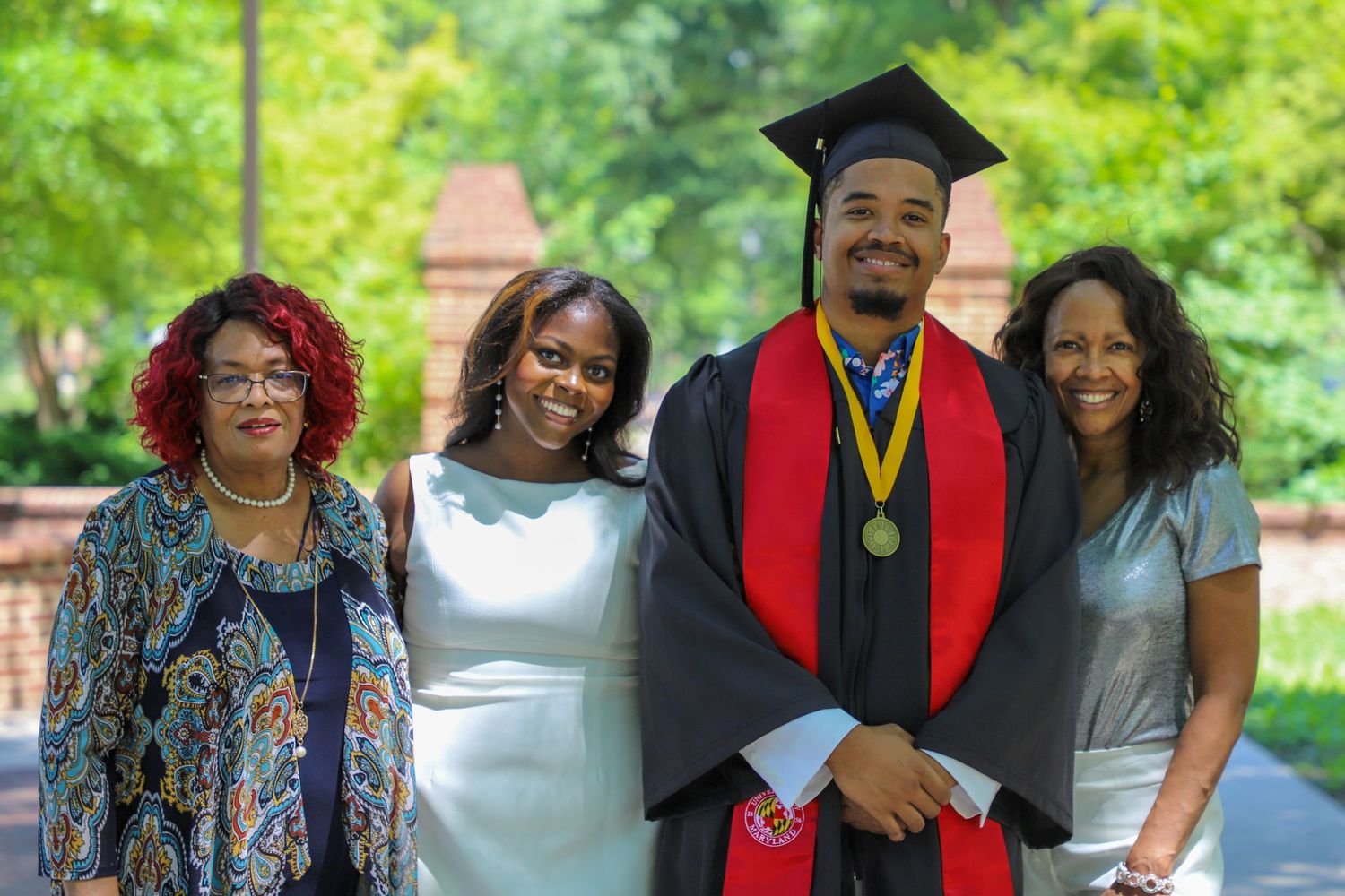 UMD grad with their family.