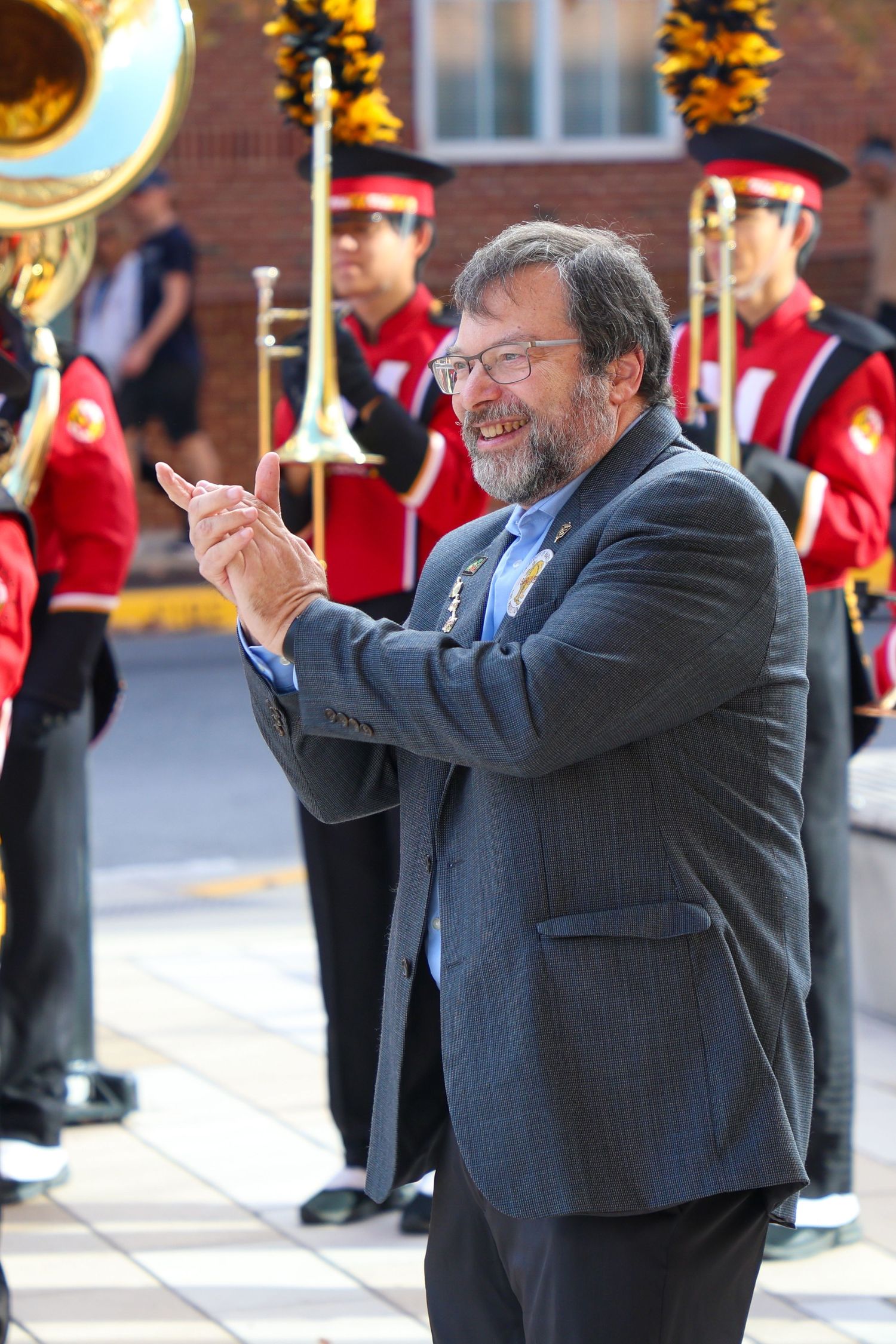 University of Maryland professor with the Mighty Sound of  Maryland in the background
