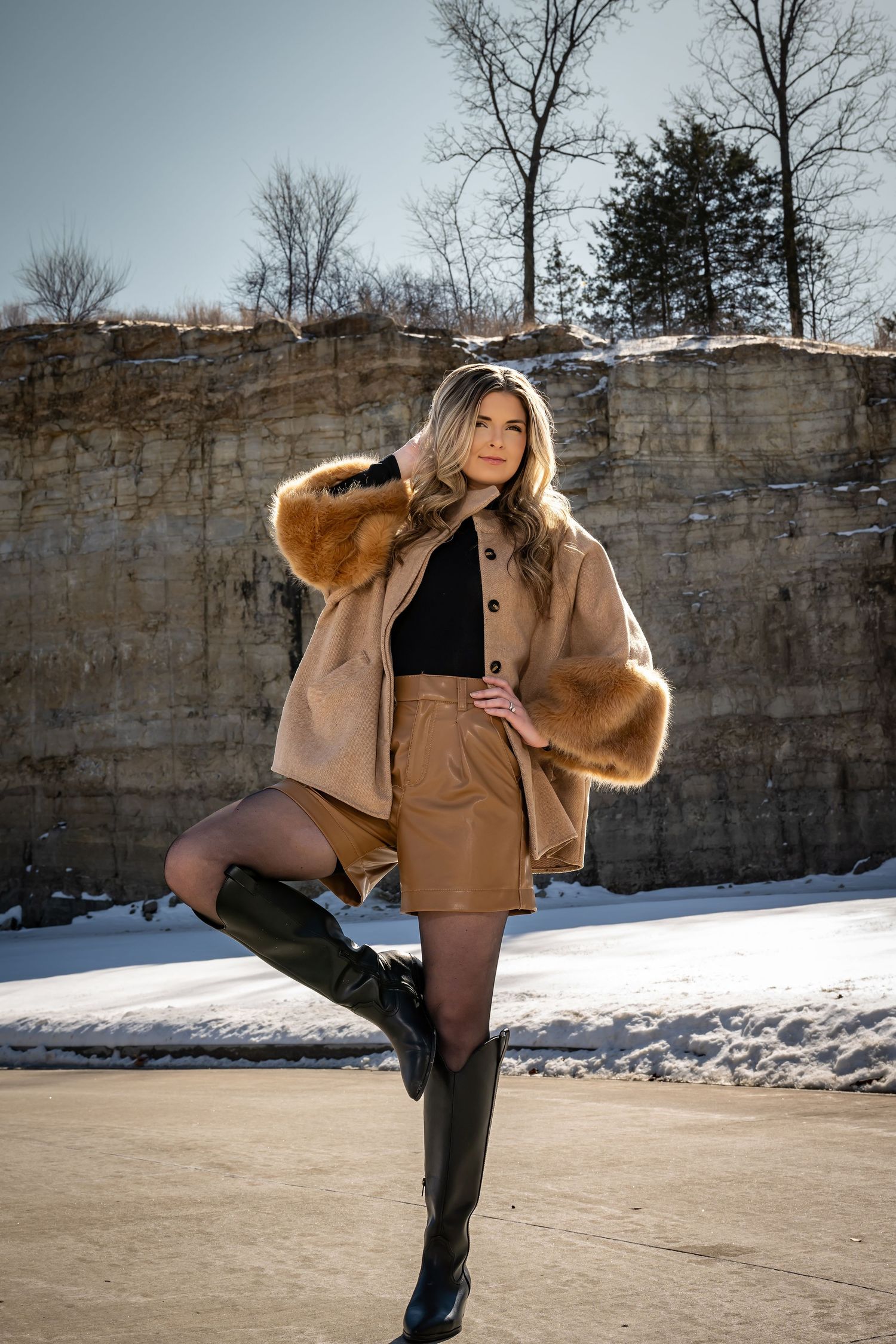Fashion photography series showing winter outfit with camel coat and boots in snowy environment.