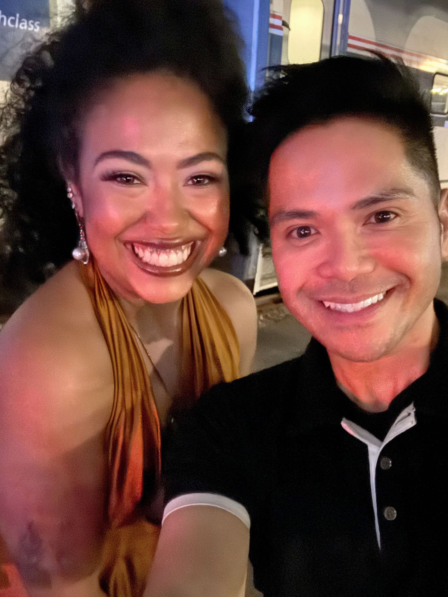 A series of five selfie photos showing two people smiling and posing together in a dimly lit setting.