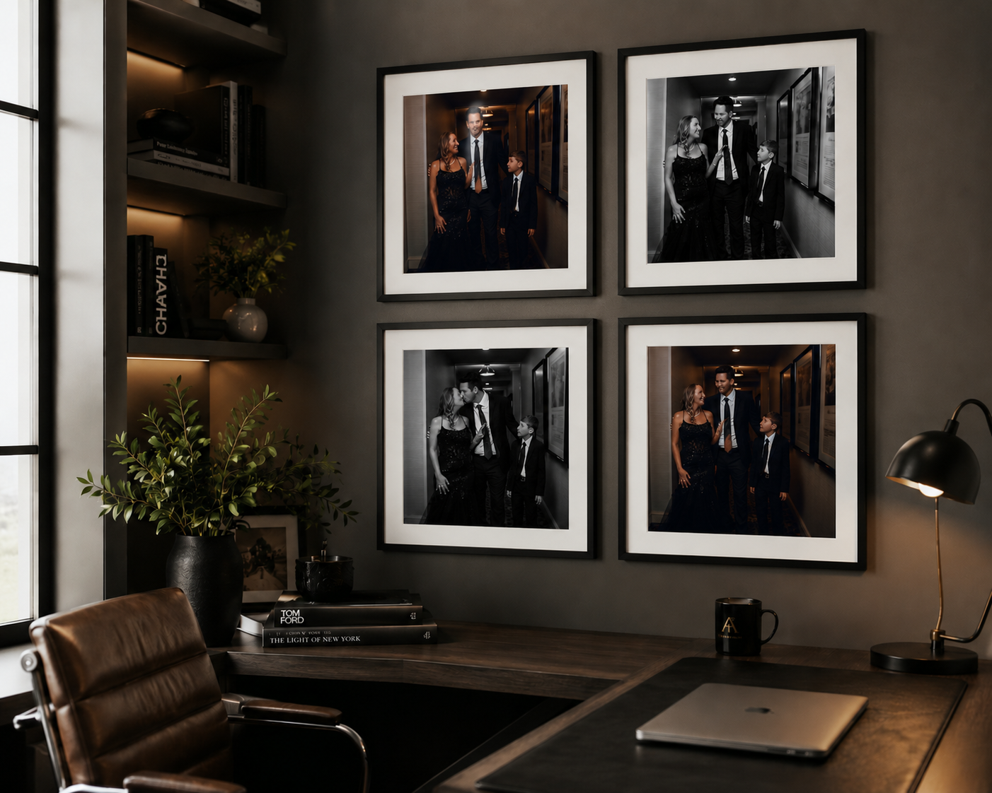 Four framed black-and-white photos of elegantly dressed people hang above a dark wood desk with leather chair.