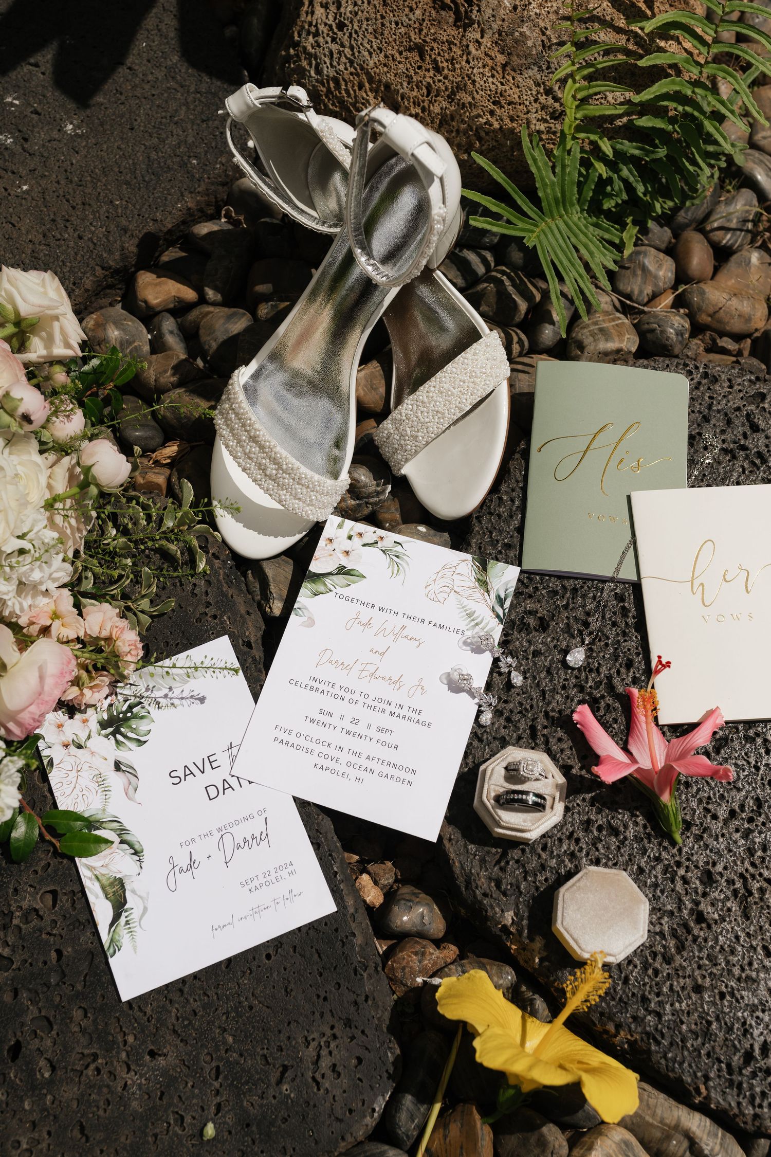 Wedding details including silver sandals, floral invitations, and delicate decorative elements.